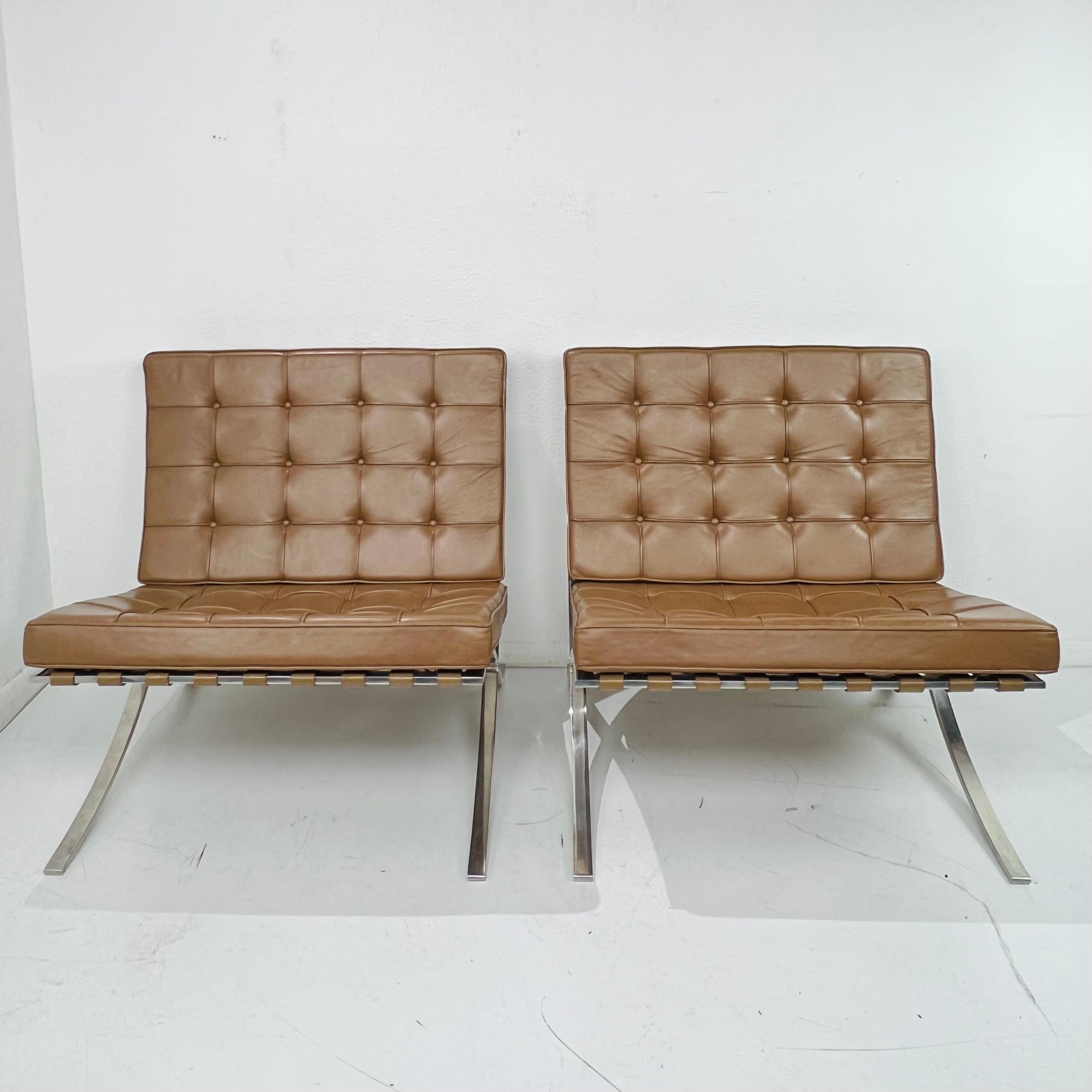 One of the most recognized objects of the last century, and an icon of the modern movement, the Barcelona Chair exudes a simple elegance that epitomizes Mies van der Rohe's most famous maxim–“less is more.” 
This handsome pair of leather Barcelona