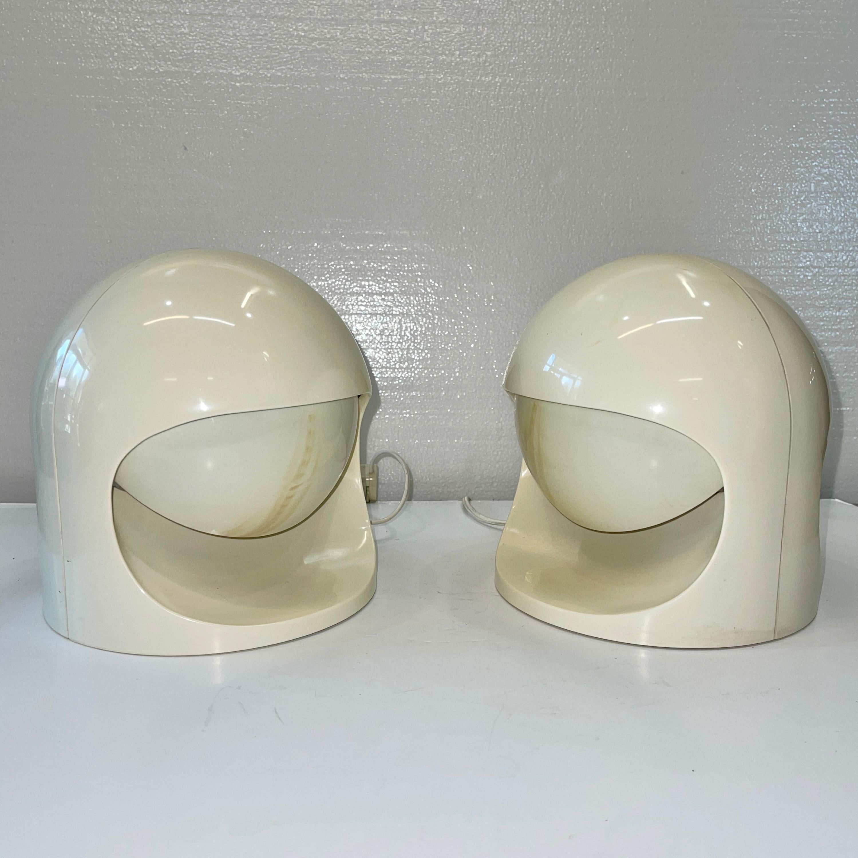 1970s Italian designed Space Age plastic eclipse lamps in the form of an astronaut helmet with adjustable opaque 'visor' diffusors to control the light.
The Interplay I (aka Selene) and II Series were actually made by ABM, Milano (which became