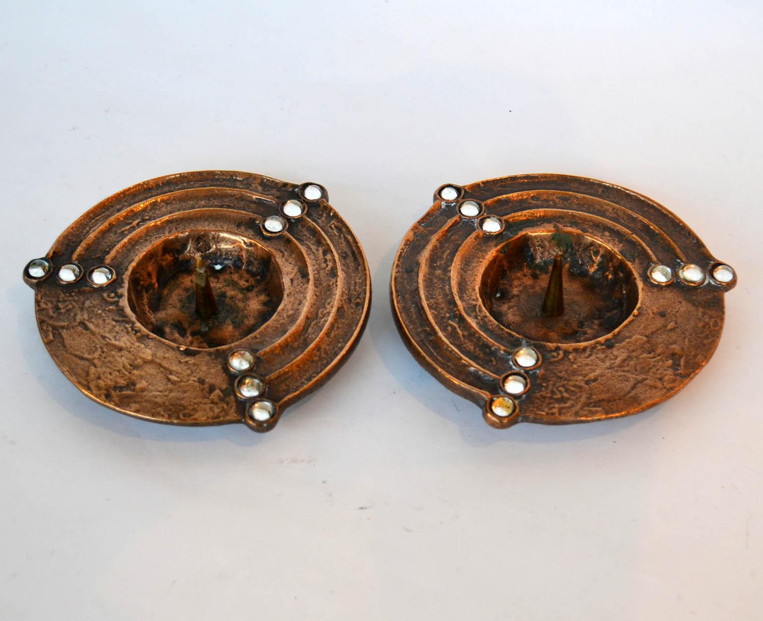 Bronze cast pair of round low candleholders decorated with pearl pattern, suitable for 4-5 cm wide candle.