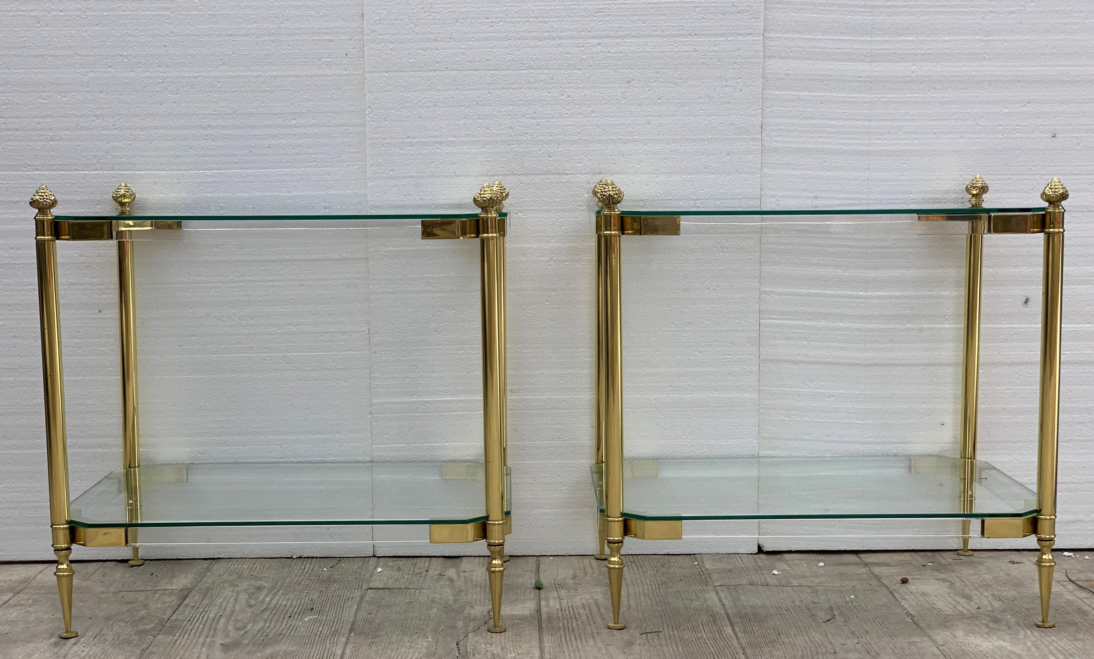 Pair of 1970s Lucite and brass two-tier side tables.