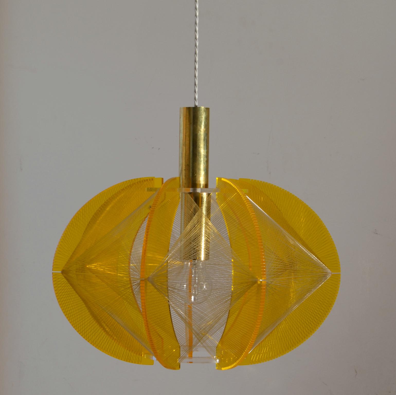 Sculptural lamps made of perspex and transparent wire accompanied brass internal fittings by by Paul Segon for Sompex. He was influenced by the Pioneer, Avant Garde artist and sculptor Naum Gabo (1890–1977). These lamps are monumental as a group