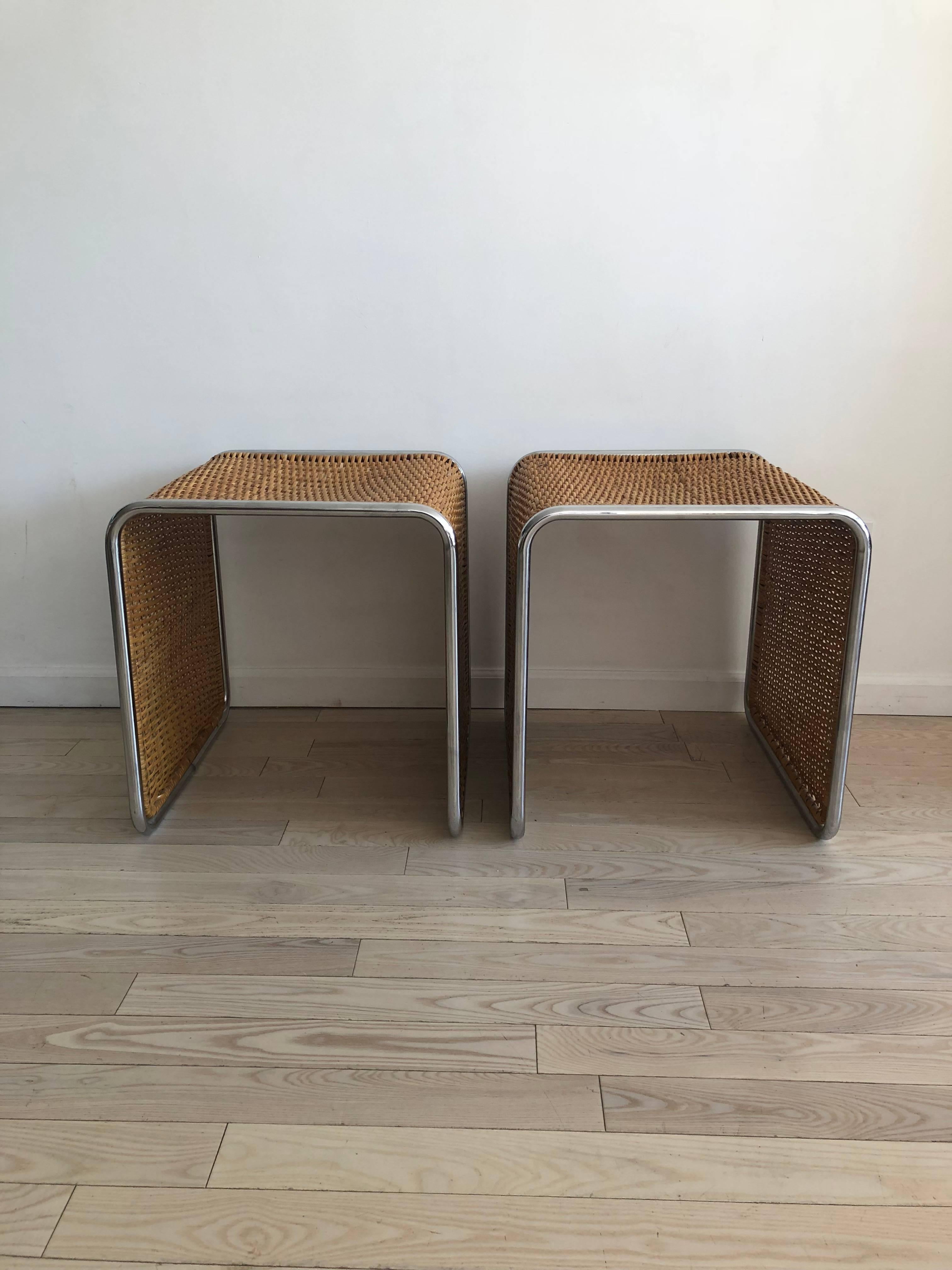 Amazing and rare wicker and chrome waterfall shaped side tables / stools.
Excellent condition, a few minor breaks in weave. Pretty shinny chrome. One piece of bent tubular chrome in the style of Mies van der Rohe. Can be uses as side tables or