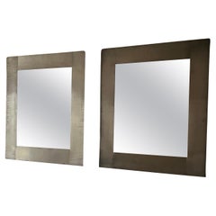 Pair of 1970’s nickel on brass framed mirrors