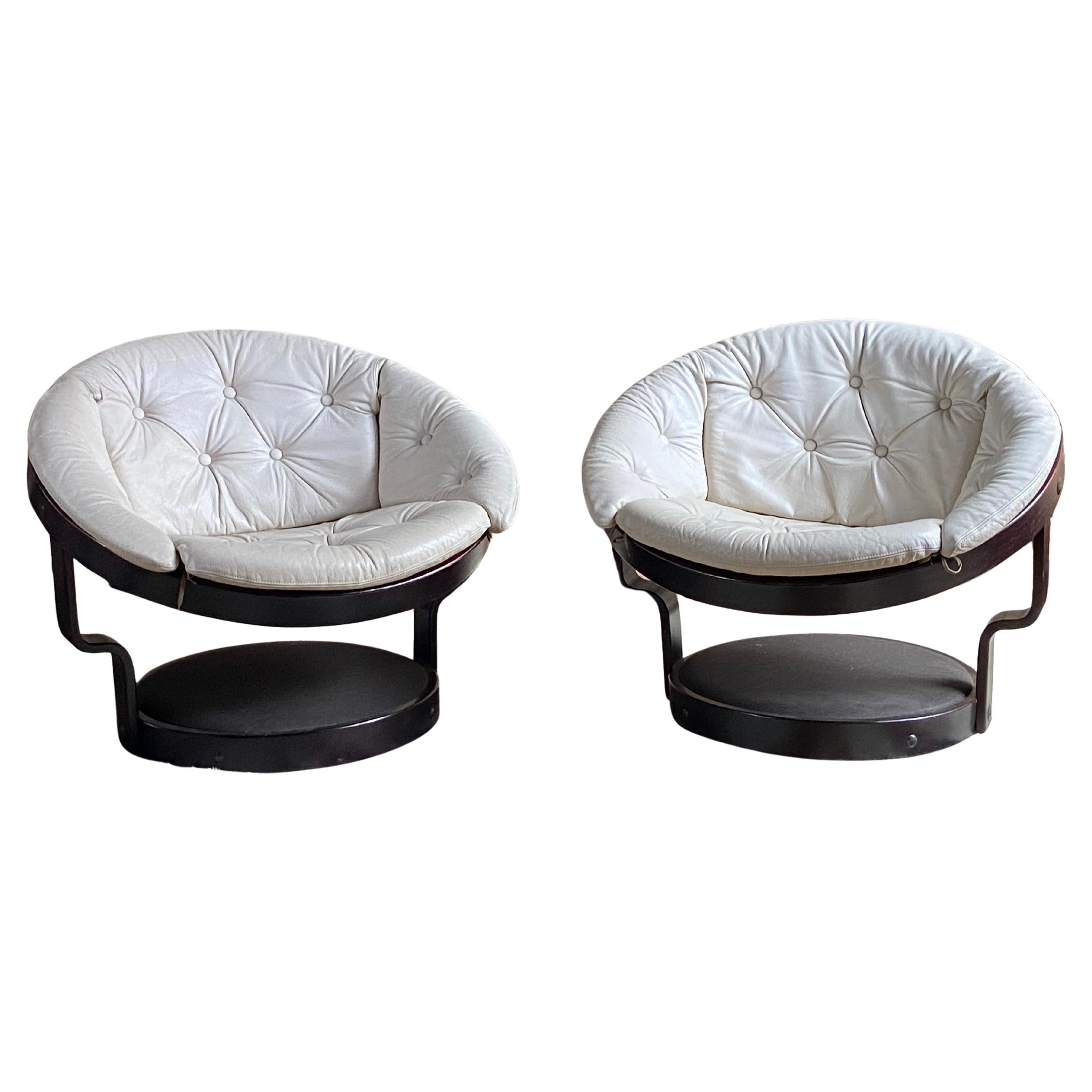 Pair of 1970's Norwegian "Convair" swivel lounge chairs in leather & bentwood For Sale