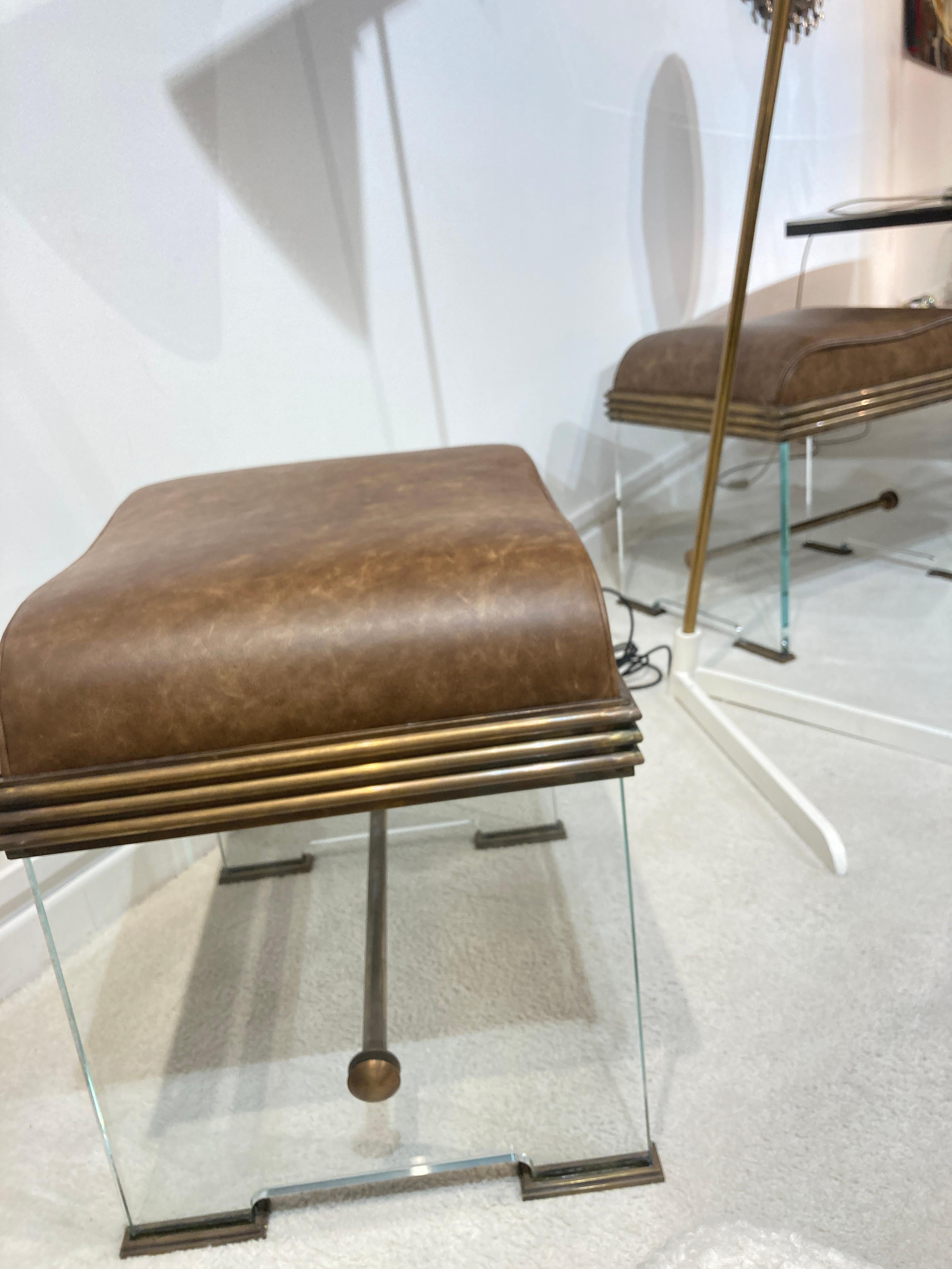 Pair of Fontana Arte ottomans in glass, brass and leather
Circa 1970's
Italy