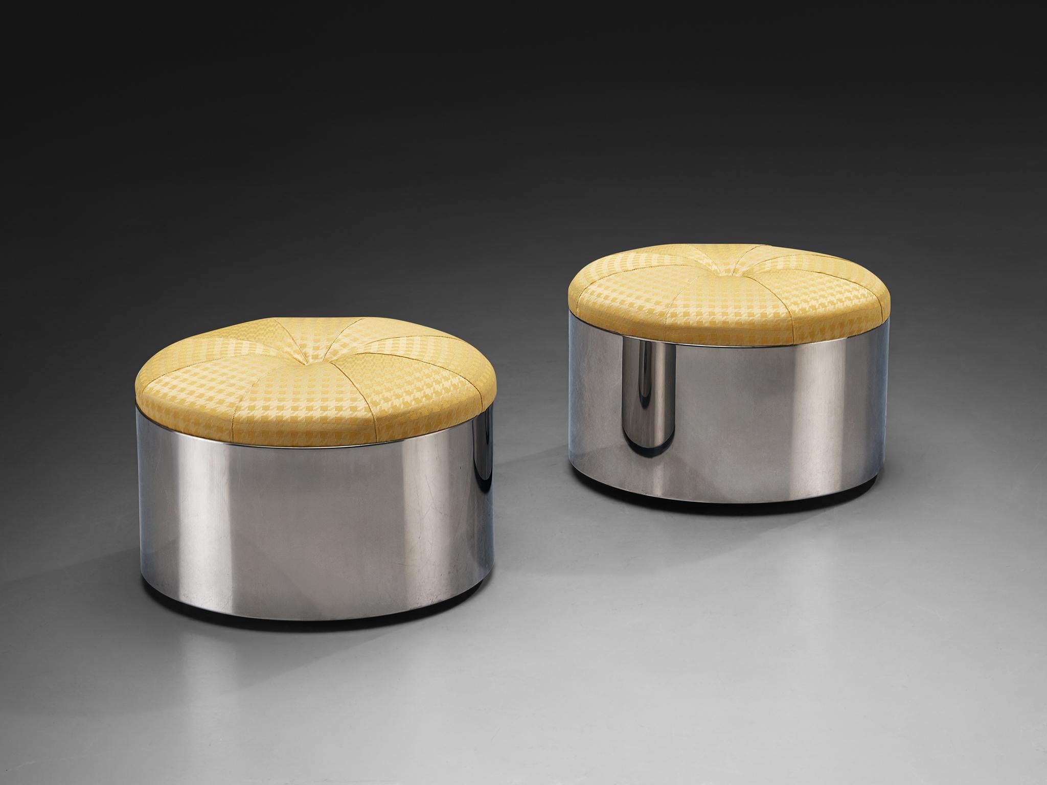 Dado Industrial Design, pair of ottomans, chrome-plated steel, fabric, Italy, 1970s

These 1970s Italian post-modern ottomans are defined by their simple, cylindrical shapes. The bases are composed of smooth, chrome-plated steel, which creates a
