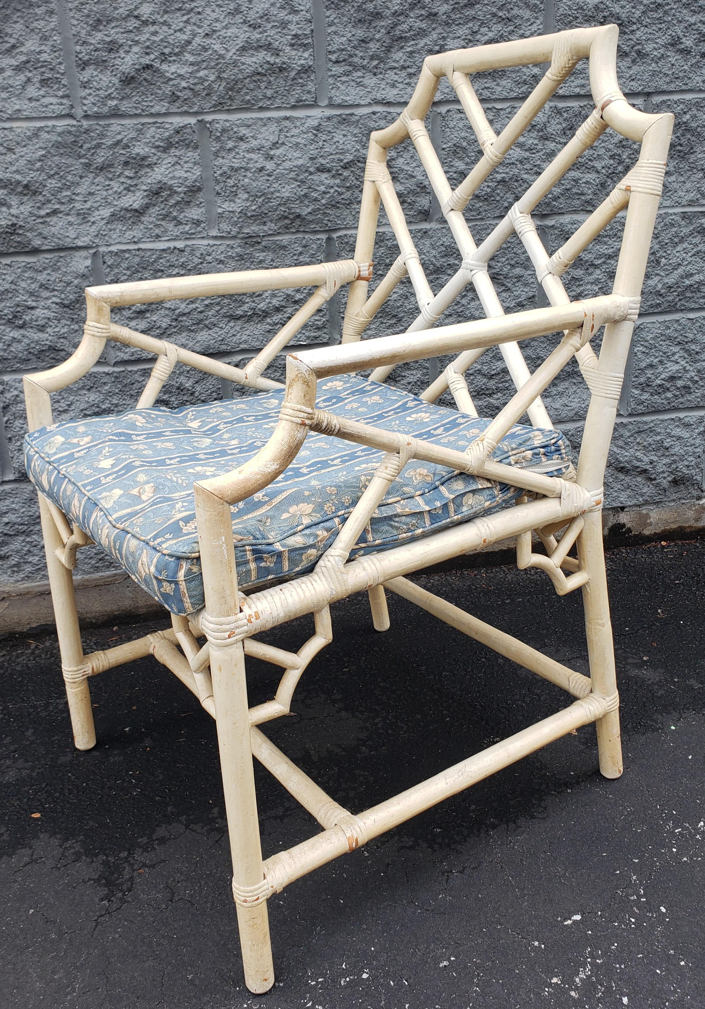 Pair of 1970s Rattan Bamboo Chippendale Armchairs in antique white color. Very sturdy. Seat high is 20