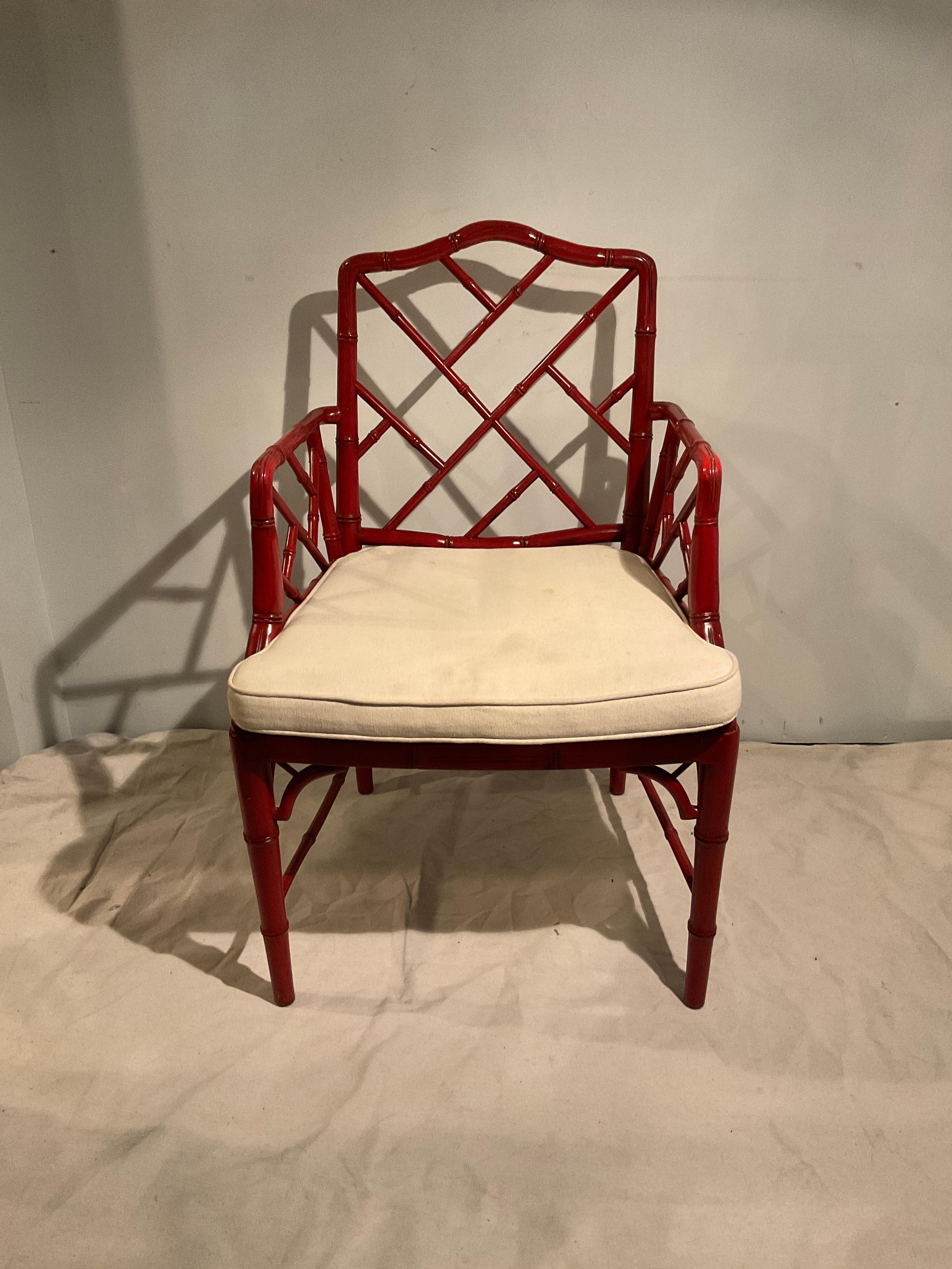 Pair of 1970s, faux bamboo armchairs by Furniture Classics Limited . Cushions have some stains. Seat height is without cushion. Height of cushion is 2”.