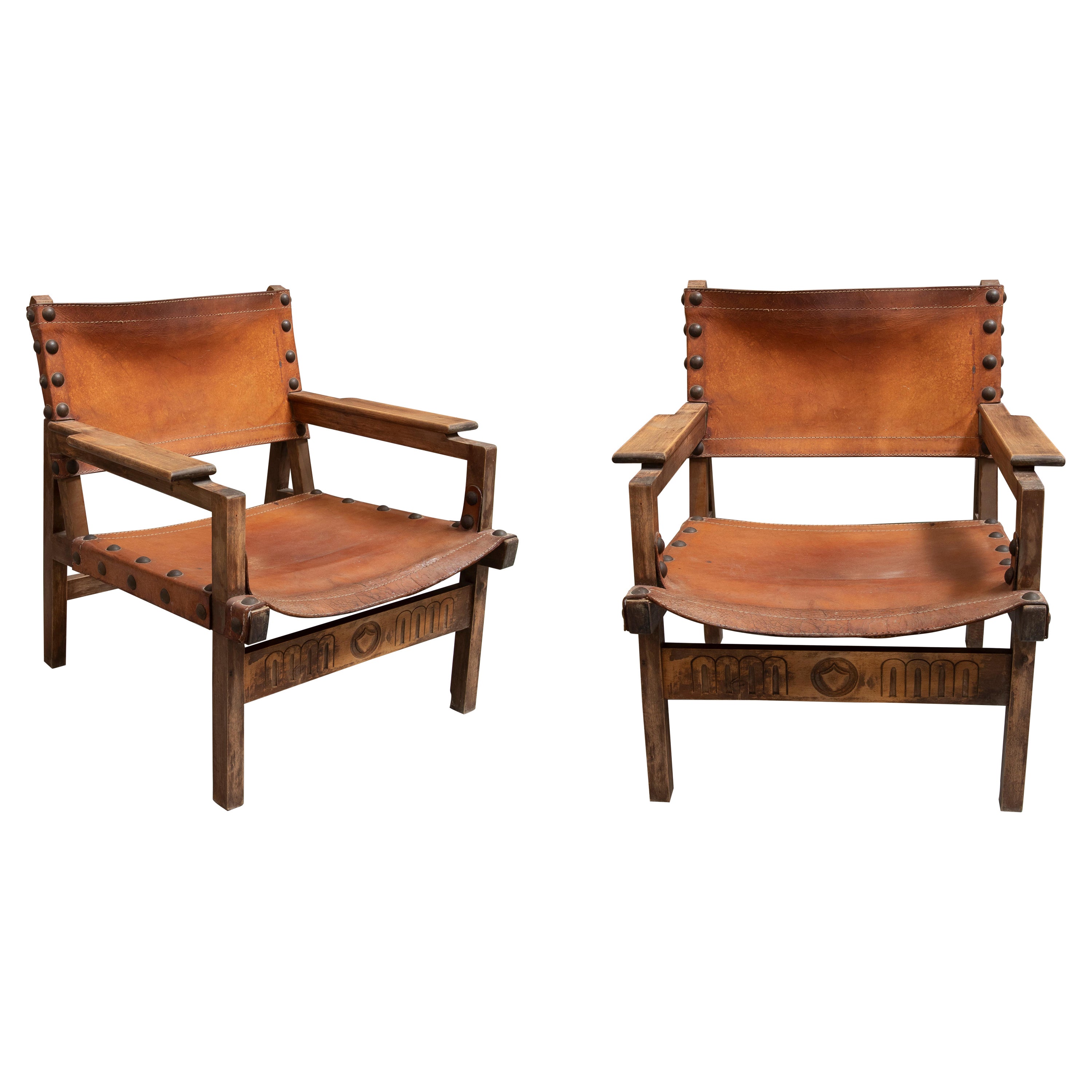 Pair of 1970s Spanish Designer Leather 
Wood Armchairs by Paco Muñoz