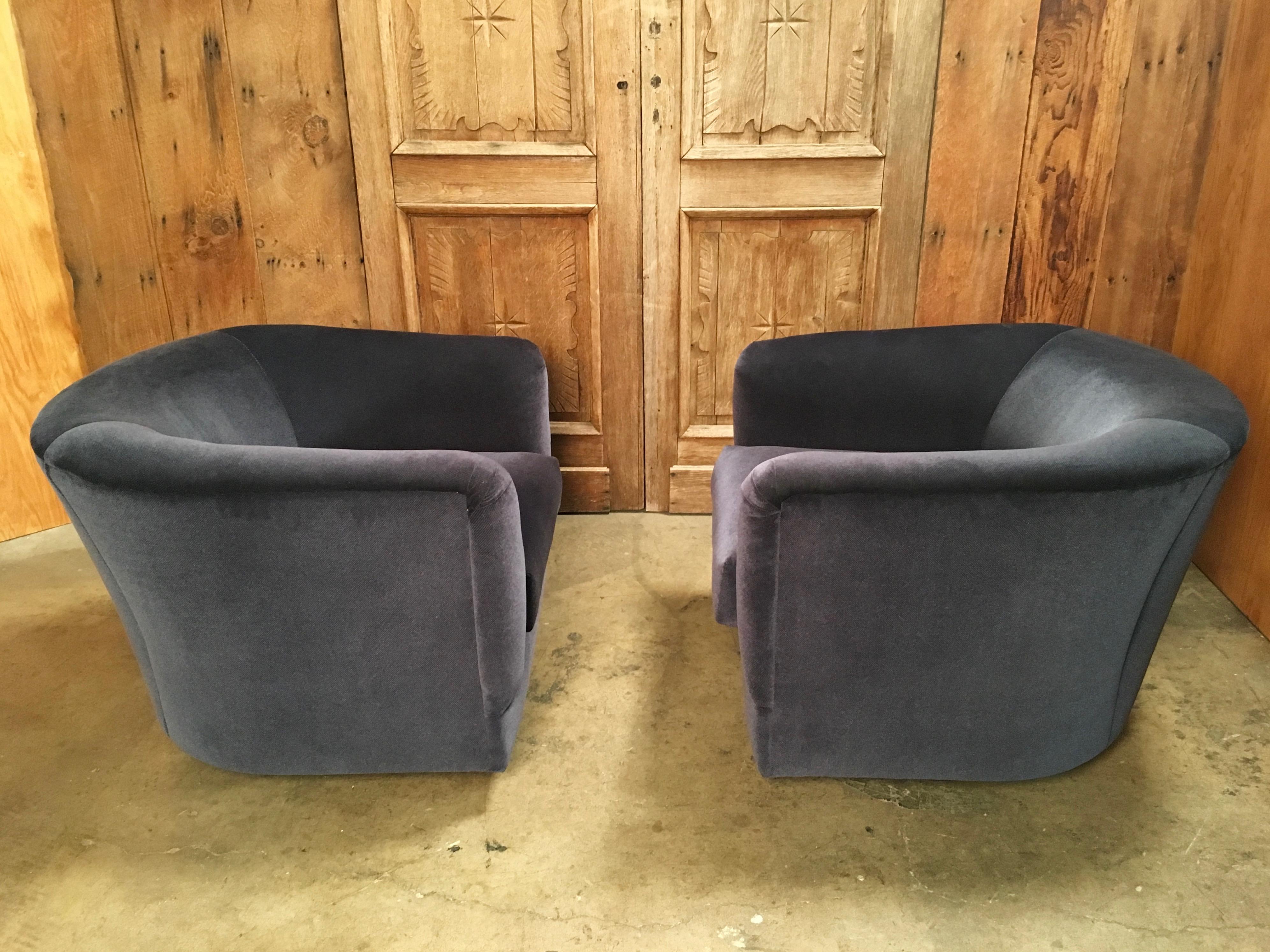 Navy blue with walnut trimmed base lounge chairs in the style of Ward Bennet or Milo Baughman