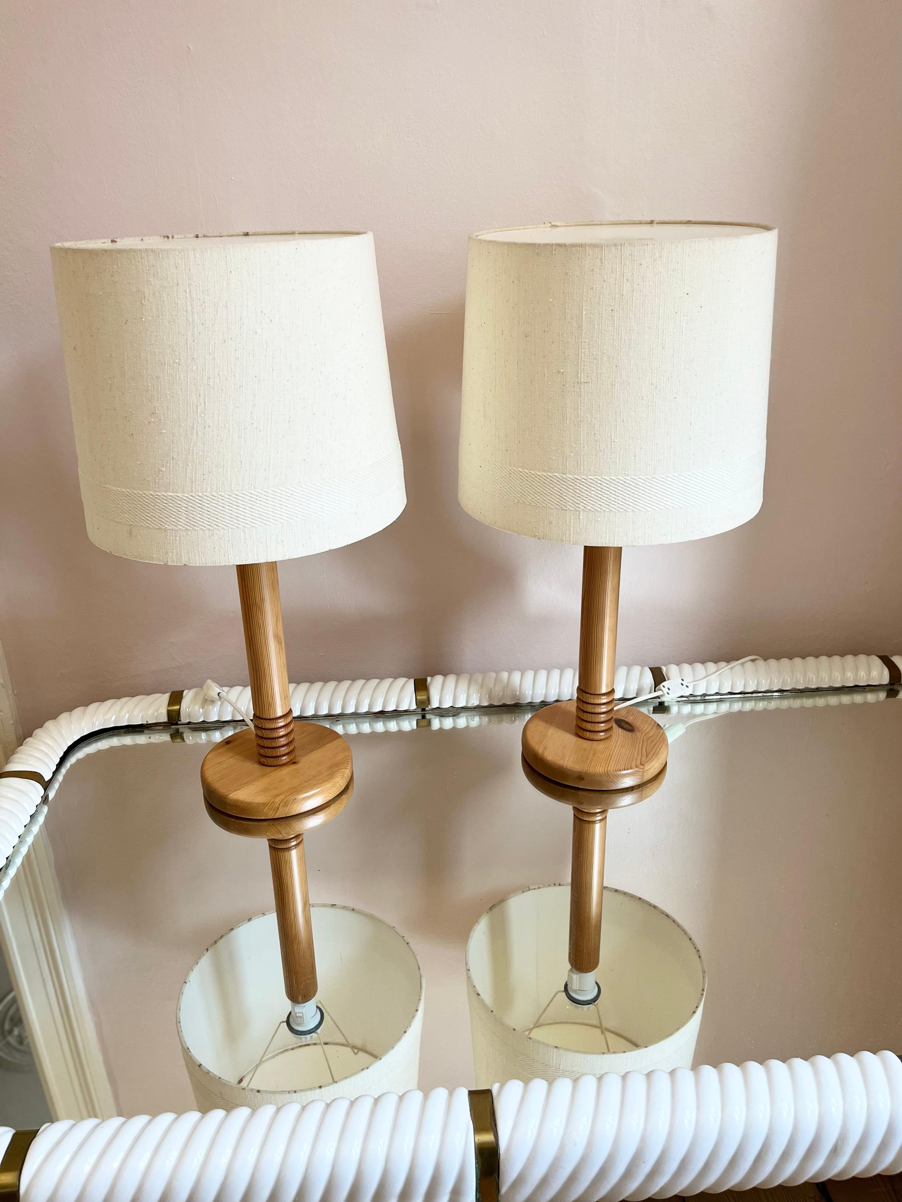 Wood Pair of 1970s tall Danish wooden table lamps For Sale