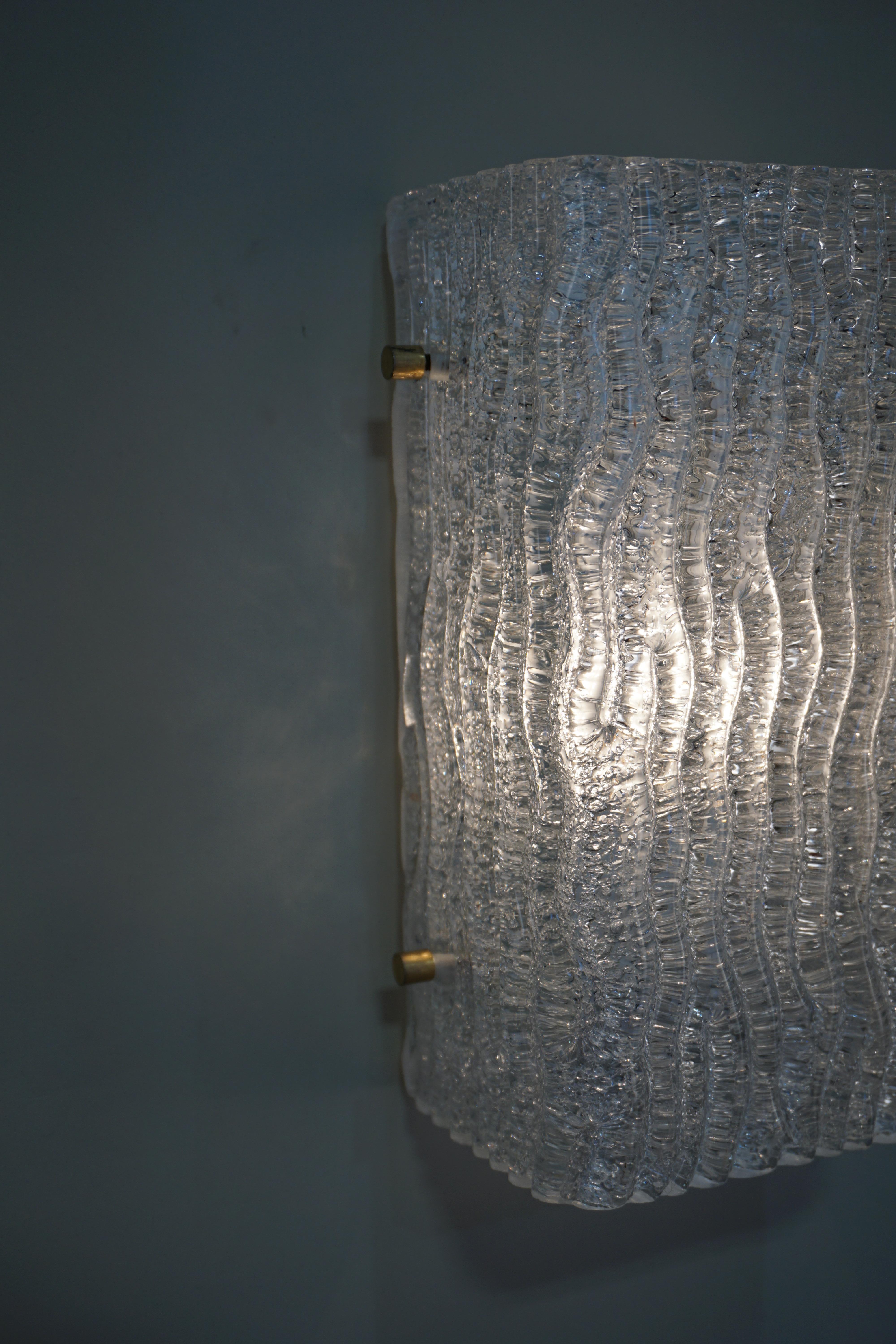 French 1970s texture glass wall sconces by Maison Arlus.
Backplate is 3
