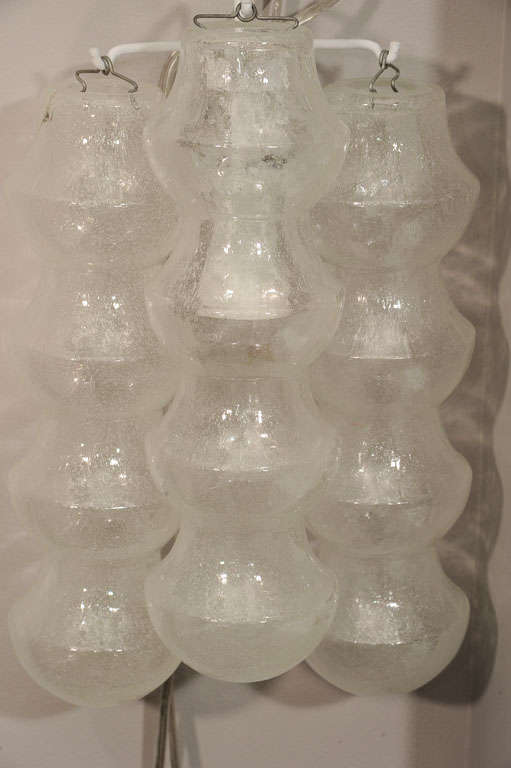 Pair of 1970s Venini translucent bubble glass sconces. There is 1 medium/standard (E26) socket on each sconce.