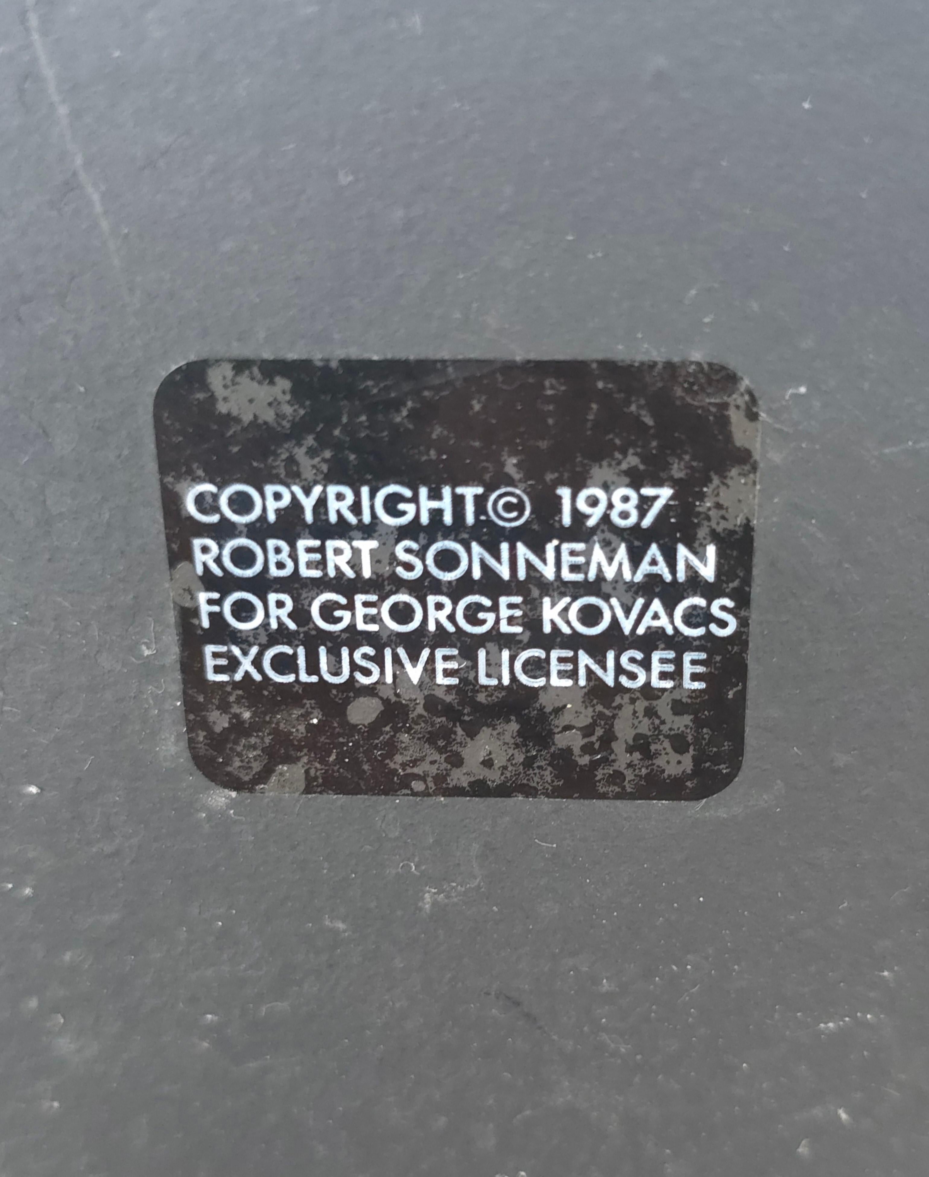 Ein Paar Stehlampen aus Messing und Stahl aus den 1980er Jahren von Sonneman (20. Jahrhundert) im Angebot