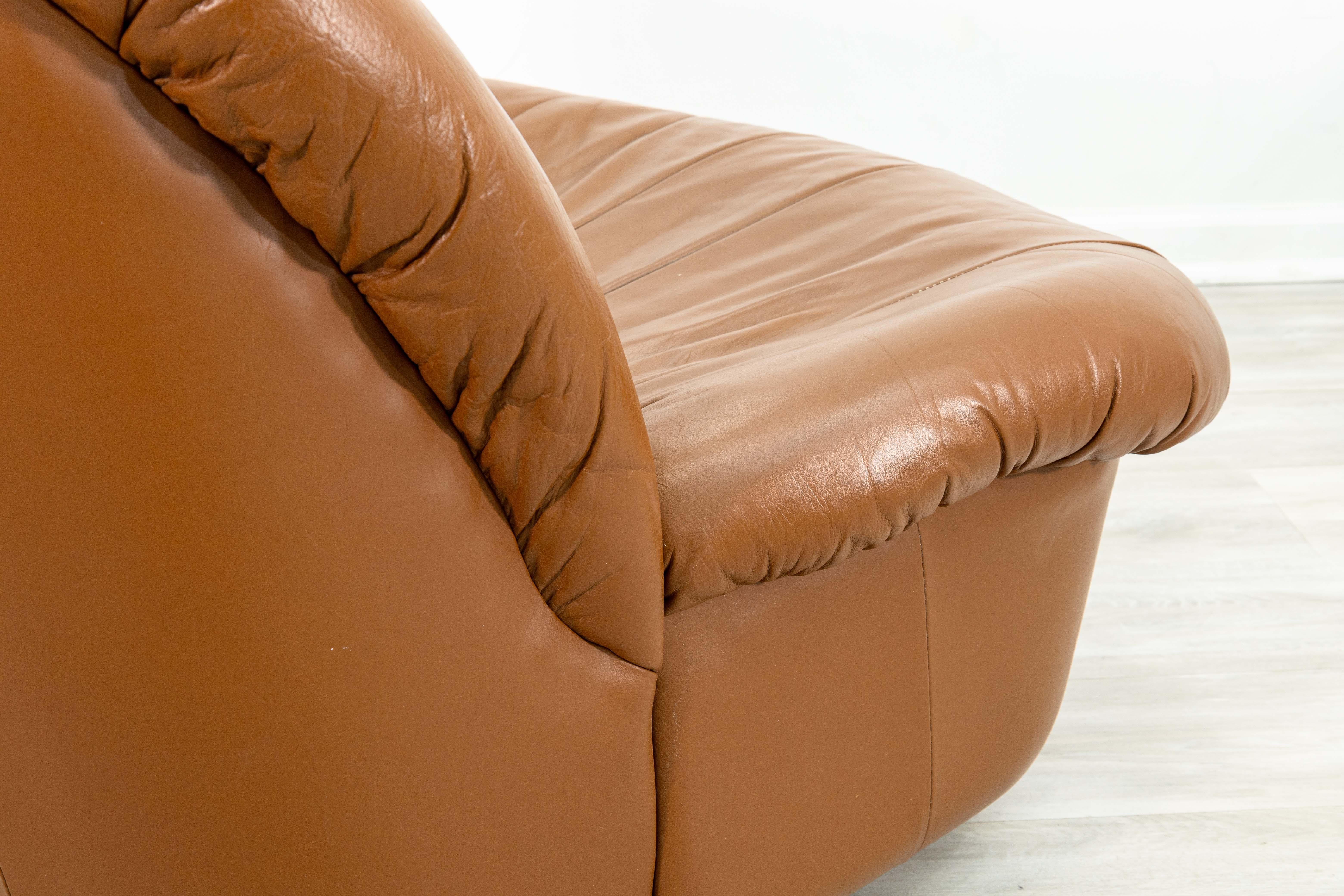 Pair of 1980s Brown Leather Swivel Glider Postmodern Lounge Chairs In Good Condition For Sale In Keego Harbor, MI