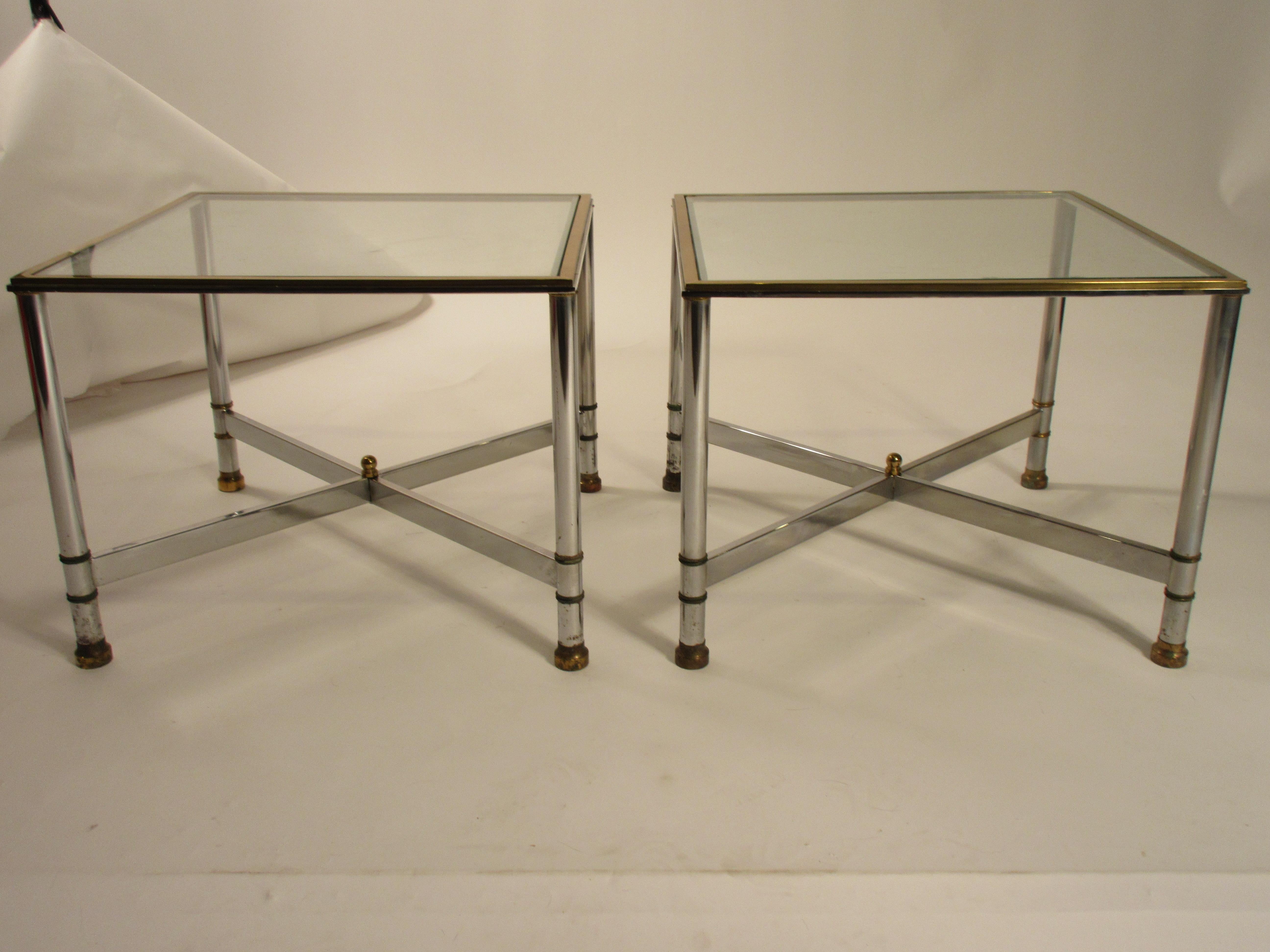 Pair of 1980s chrome side tables with brass accents.