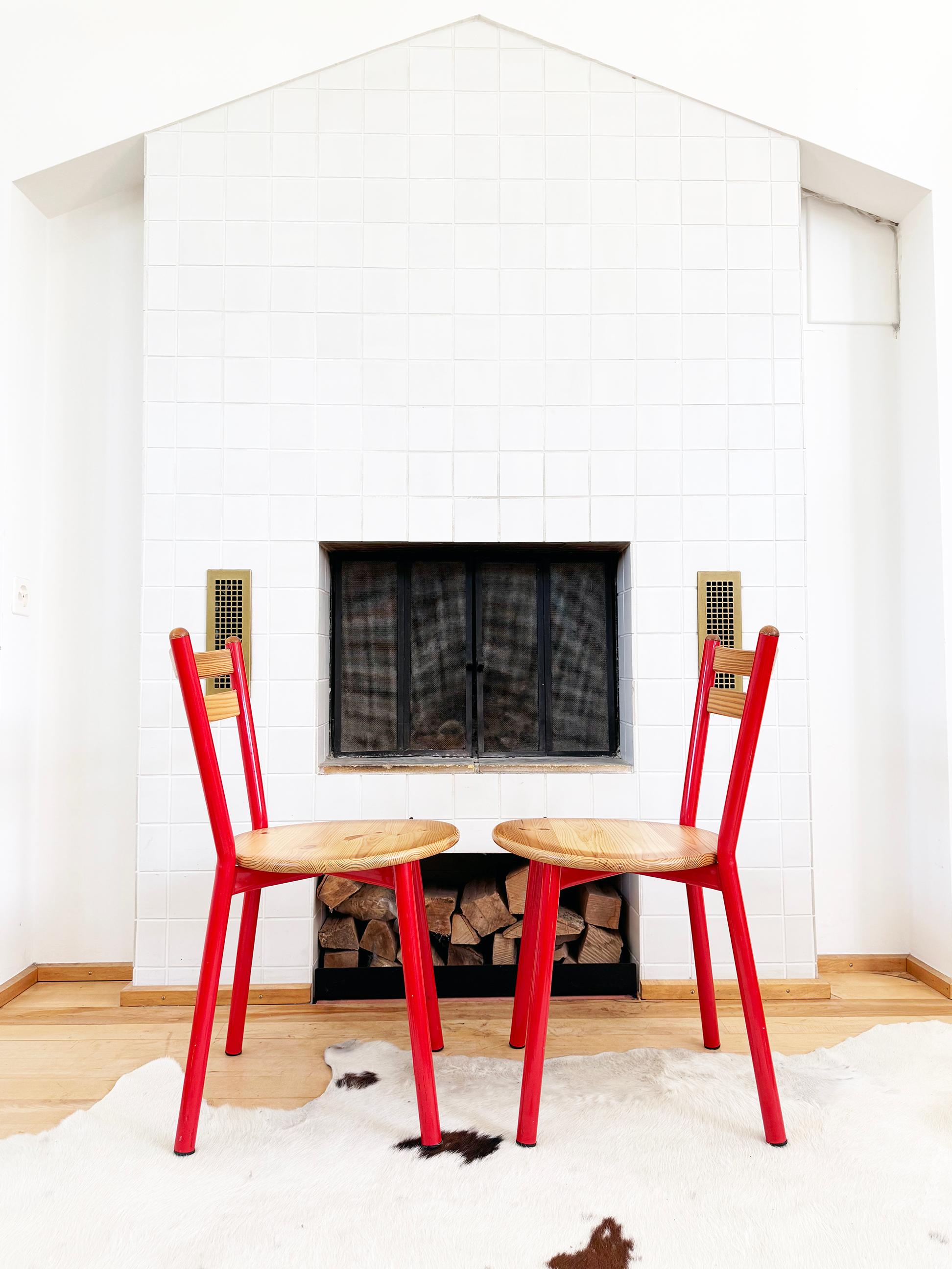  Incredible pair of 1980s Pinewood and red accent chairs. 