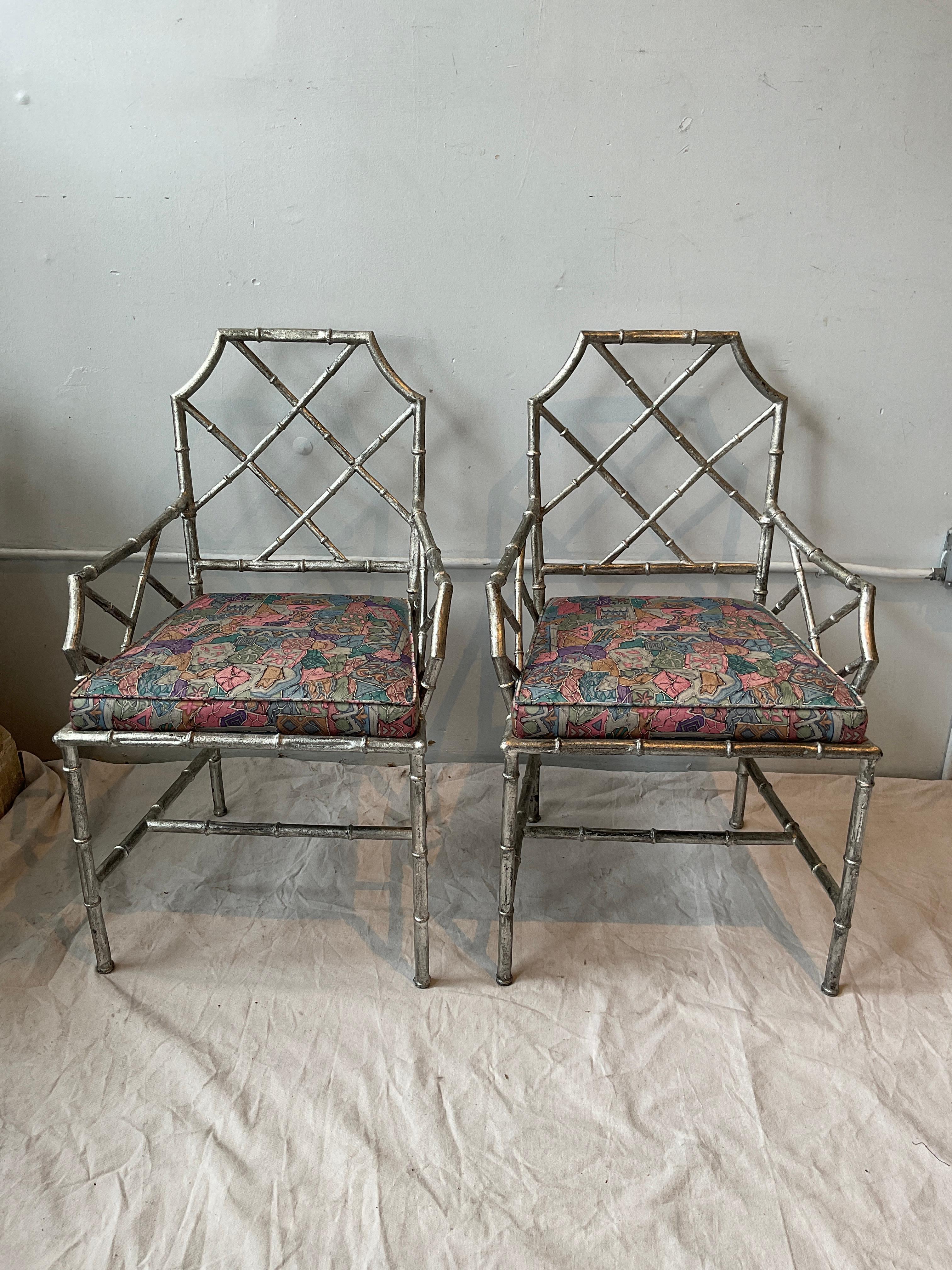 Pair of 1980s iron Italian silver leaf faux bamboo armchairs. Heavy chairs. 
Needs reupholstering.