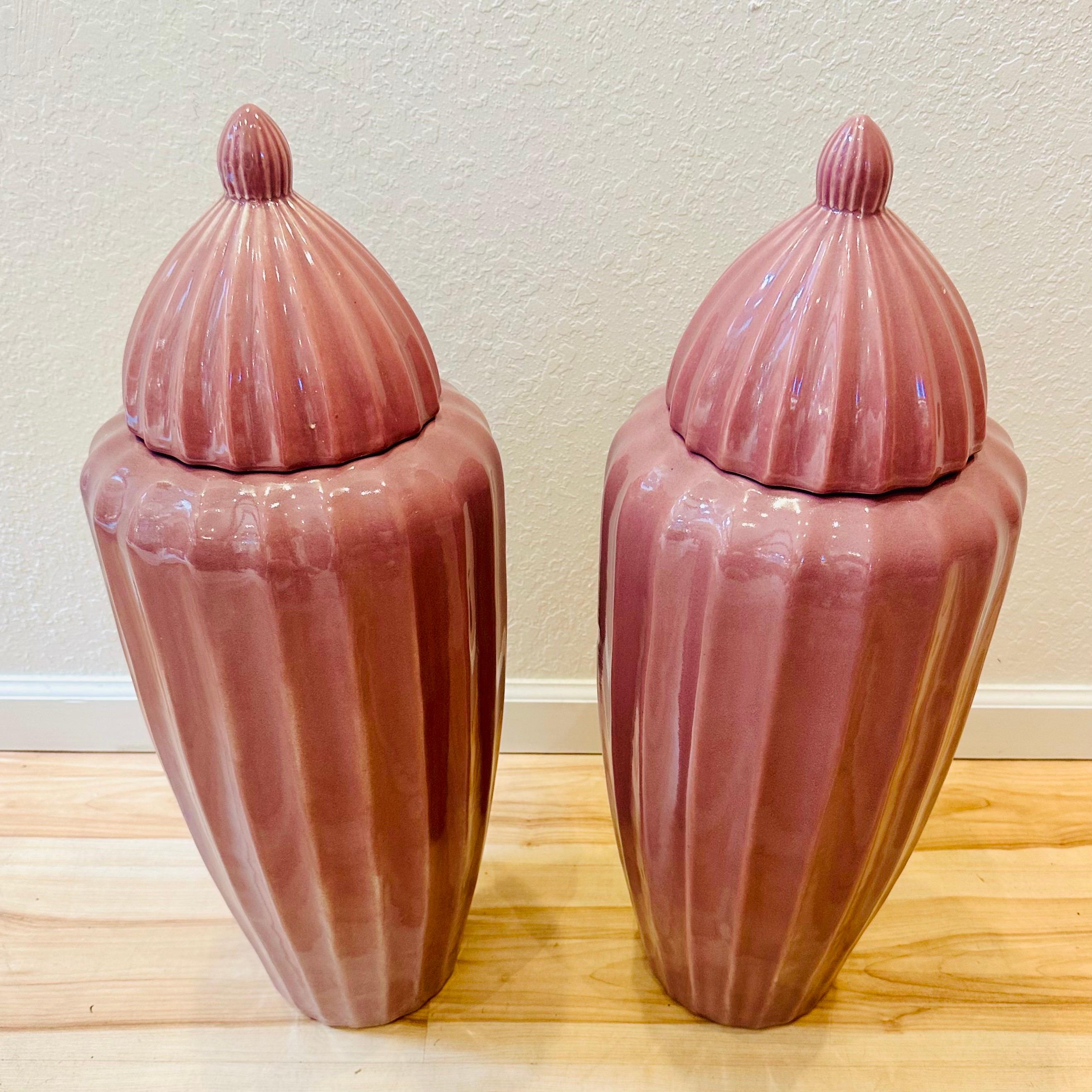Pair of 1980s large light purple ceramic ginger jars. These jars stand out with their generous size, making them perfect statement pieces for any space. The light purple glaze lends a subtle touch of color, adding a pop of elegance to any room. In