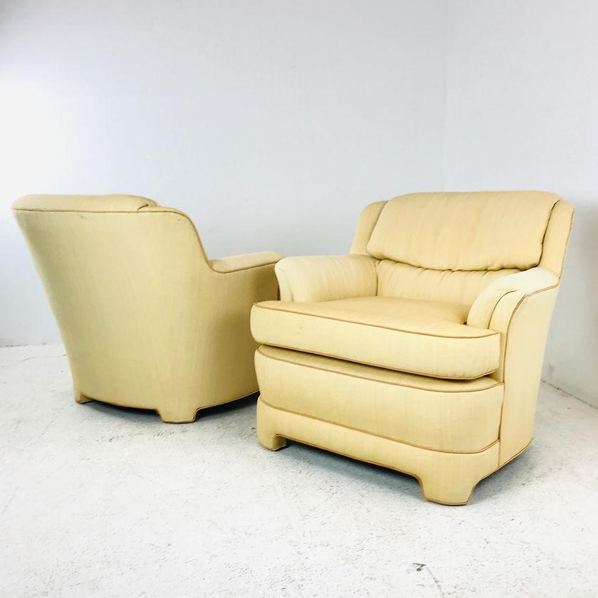 Pair of beige 1980s Marge Carson armchairs with original tag. Reupholstery recommended.