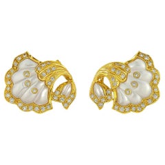 pair of 1980
s mother of pearl and pave diamond clip-on earrin