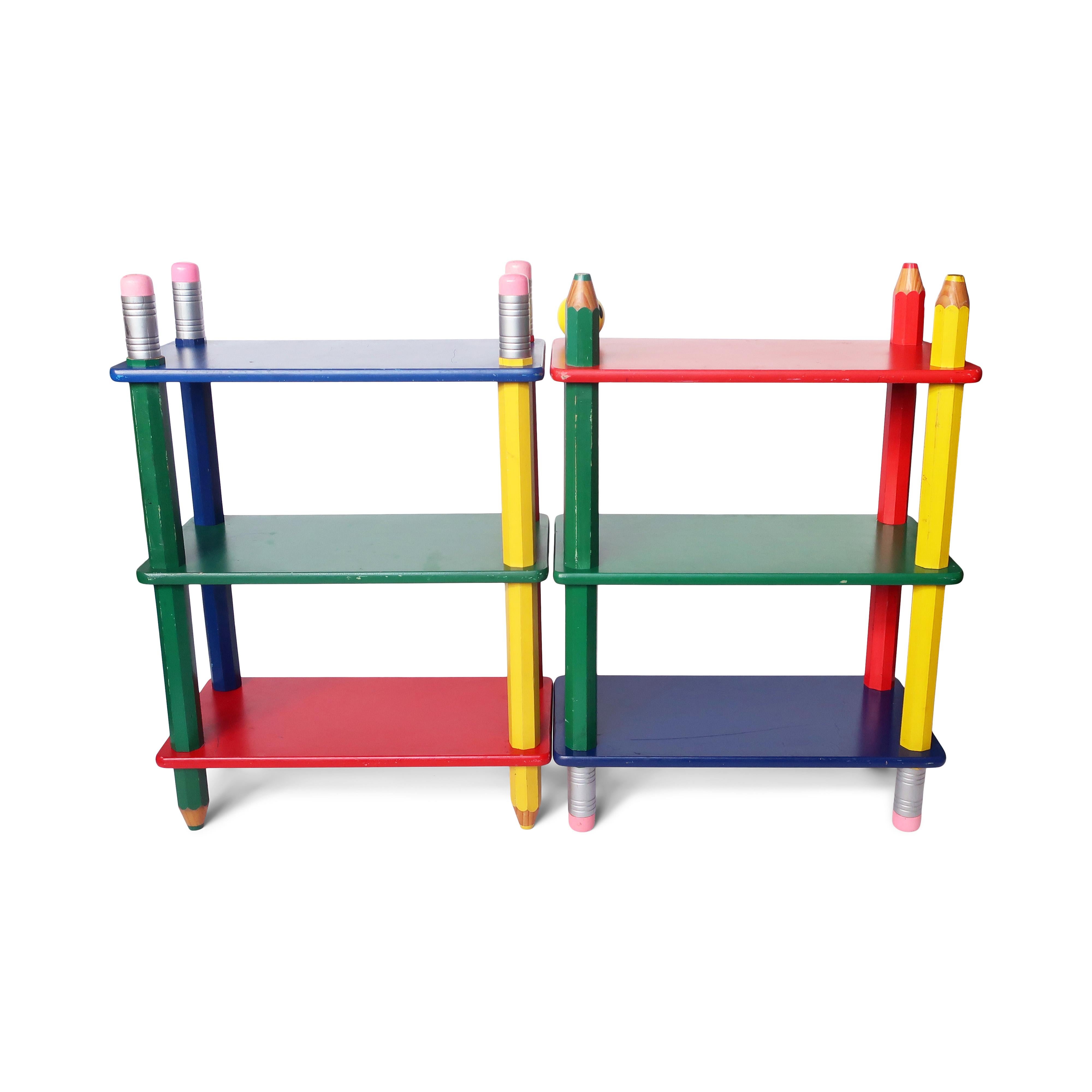 A pair of great pieces from Pierre sala's postmodern pencil themed children's furniture from the 1980s for Pierre Sala Furniture. Its striking primarily colored design is composed of three shelves (one blue, one green, and one red) supported by four