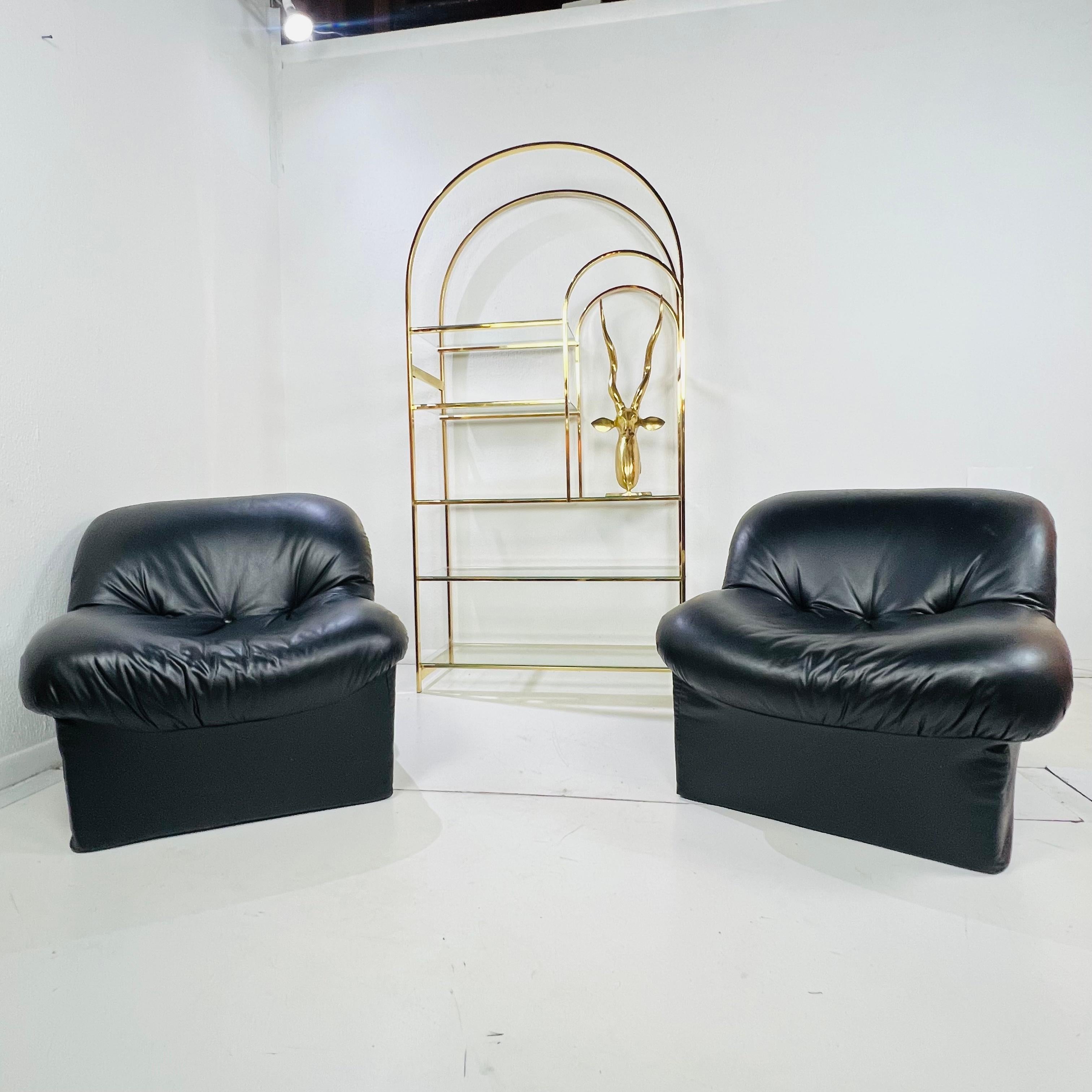 Sculptural, cozy, and unapologetically 80s. This pair of postmodern lounge chairs brings the bold curves and playful proportions that defined the design decade.

Crafted entirely of lightweight foam, these chairs have a soft, architectural