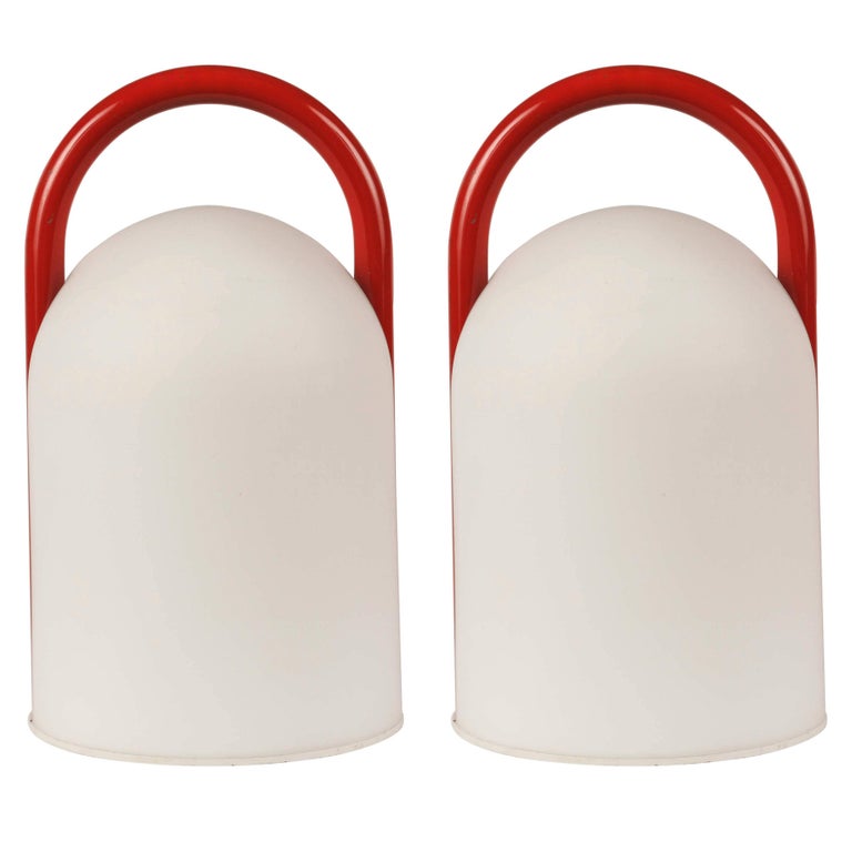 Pair of 1980s Romolo Lanciani tender table lamps for Tronconi. Executed in opaline glass and red enameled metal, Italy, circa 1980s. A surprisingly refined and minimal design, especially for its time and place.

Price is for the pair. Three lamps