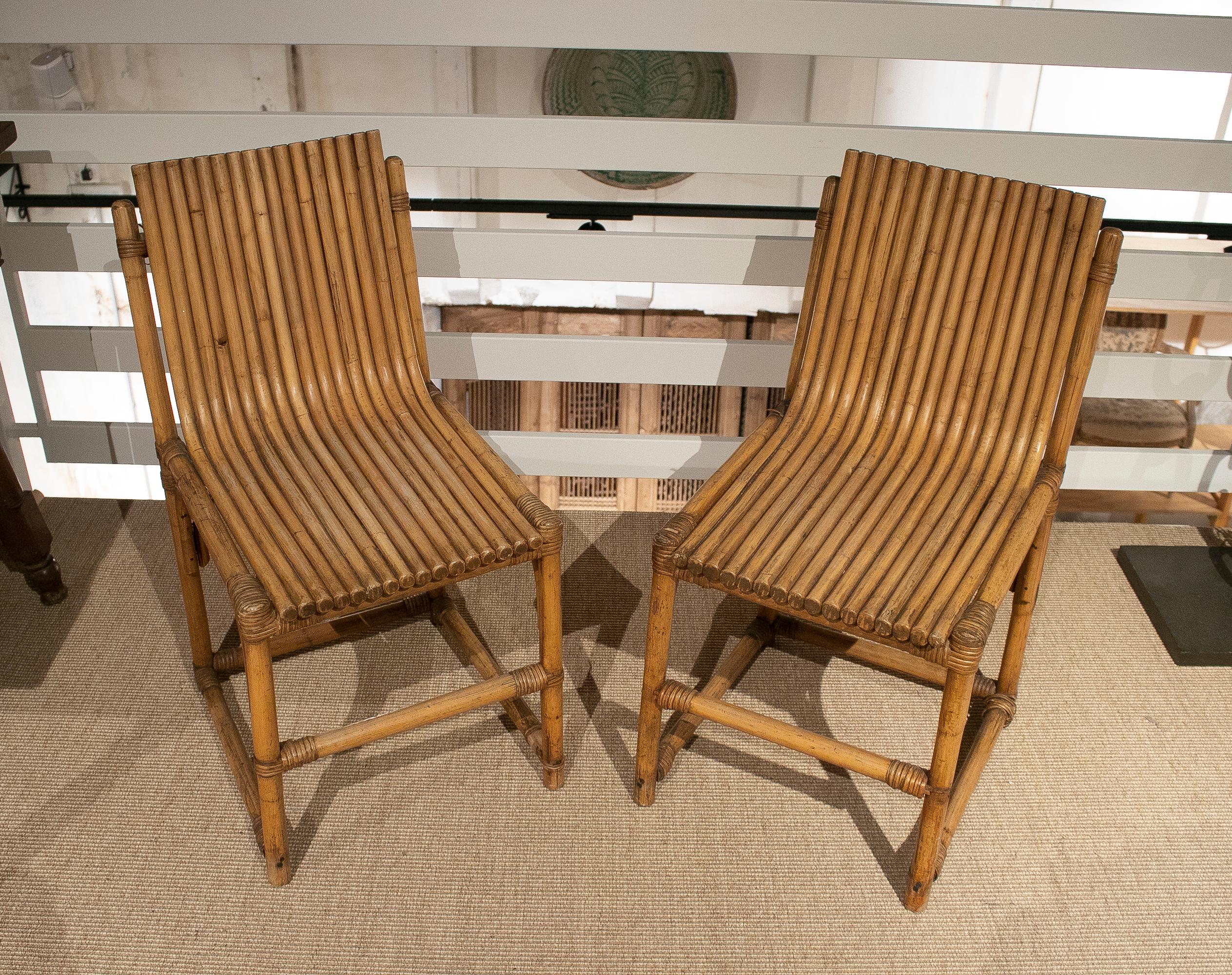 Pair of vintage 1980s Spanish bamboo chairs.