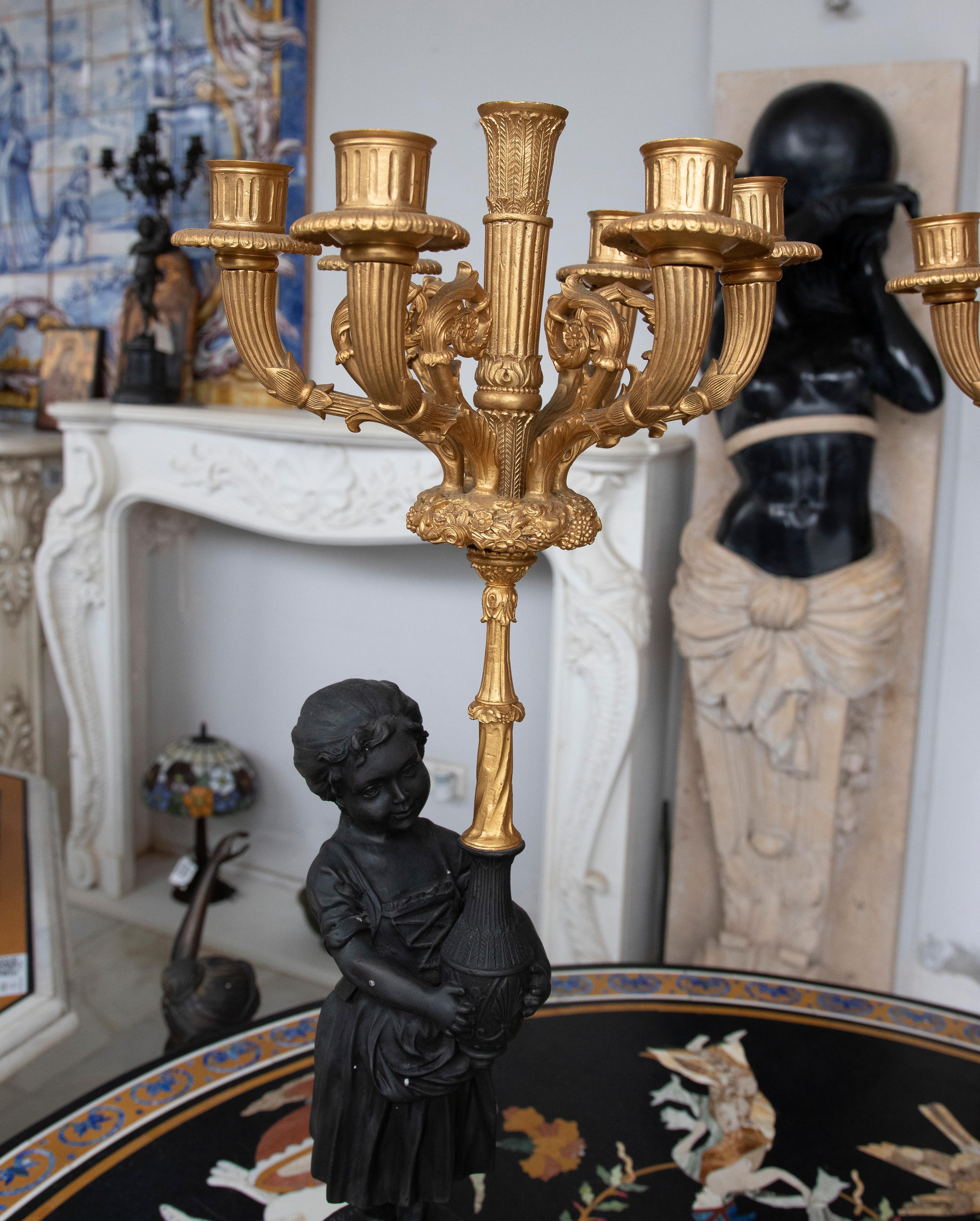 Pair of 1990s French classical 2-tone bronze boy and girl 6-arm table candelabra with marble pedestal plinth bases.