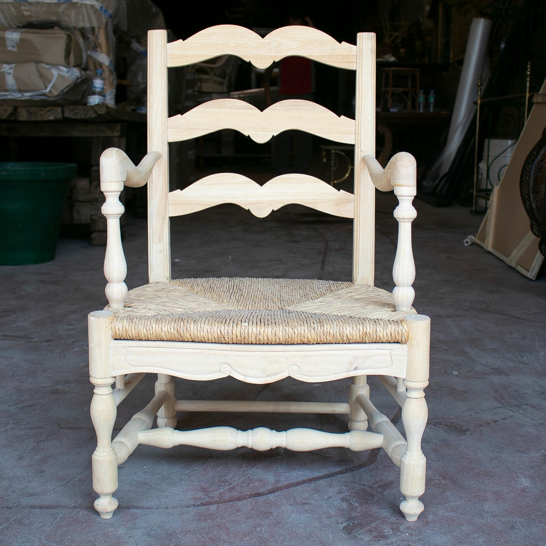 Pair of rustic 1990s Spanish Andalusian wooden rope bottomed armchairs.