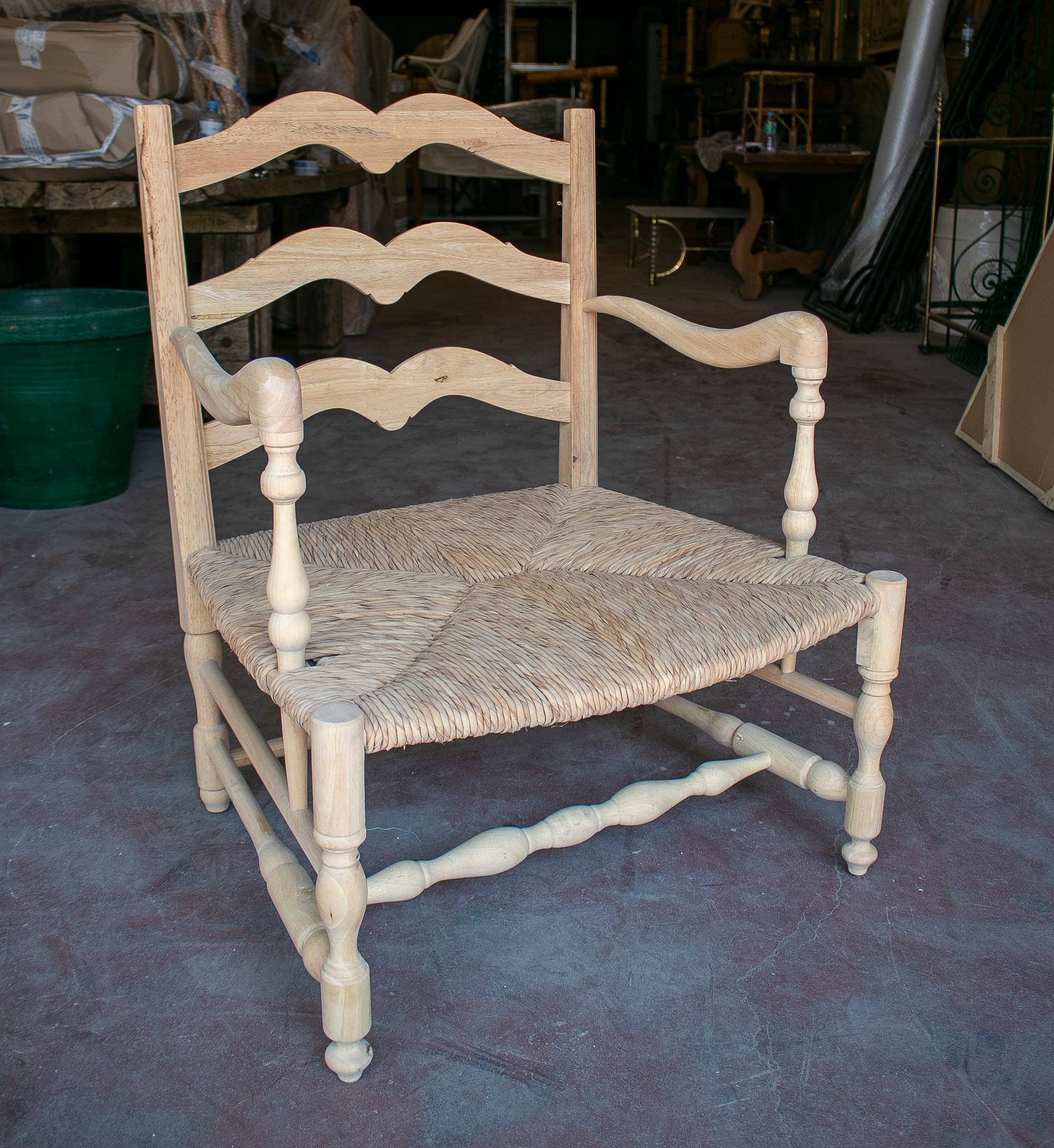 Rustic pair of 1990s Spanish Andalusian wooden rope bottomed armchairs.