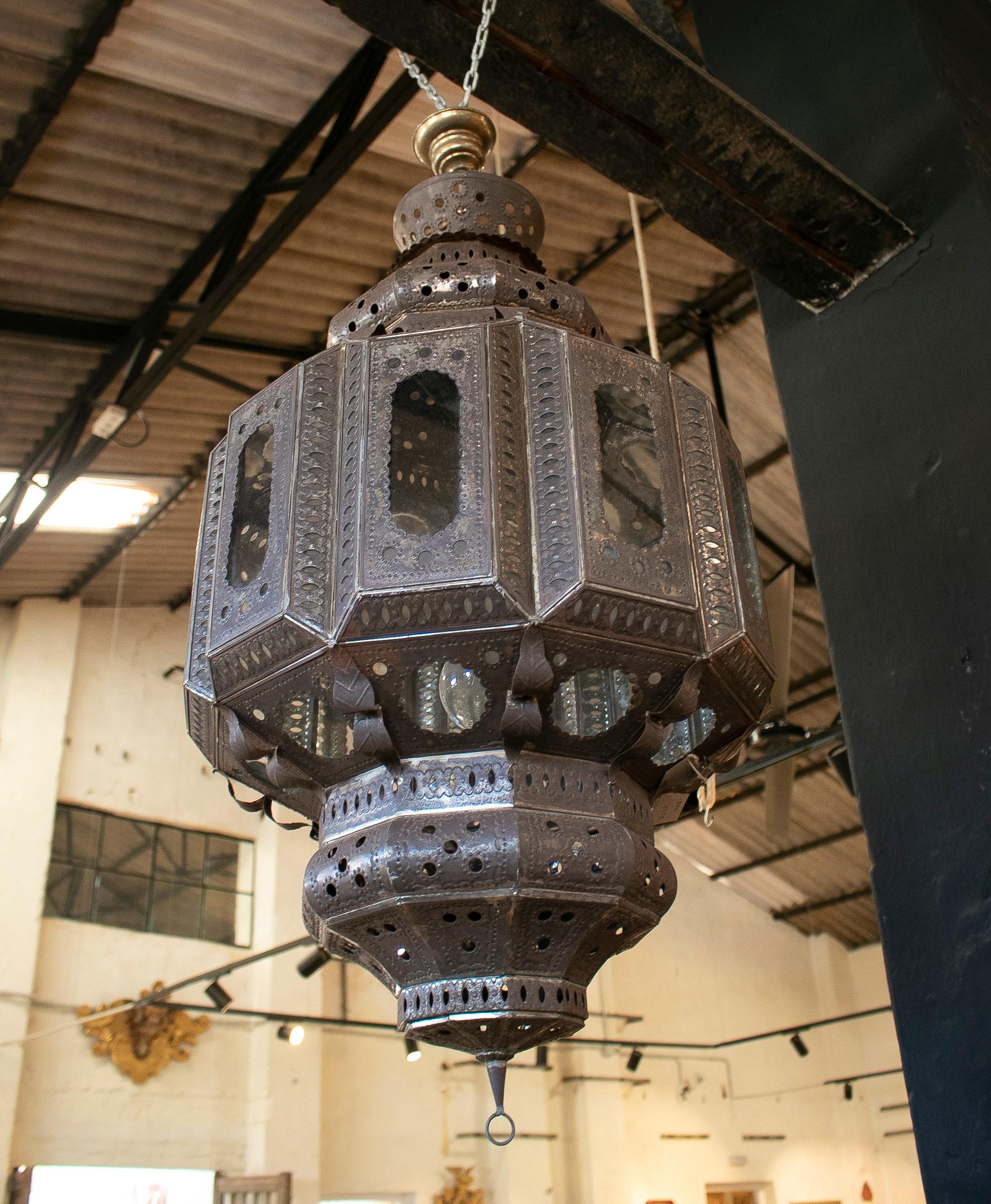 Pair of 1990s Spanish handmade iron ceiling hanging lamp lanterns.
    