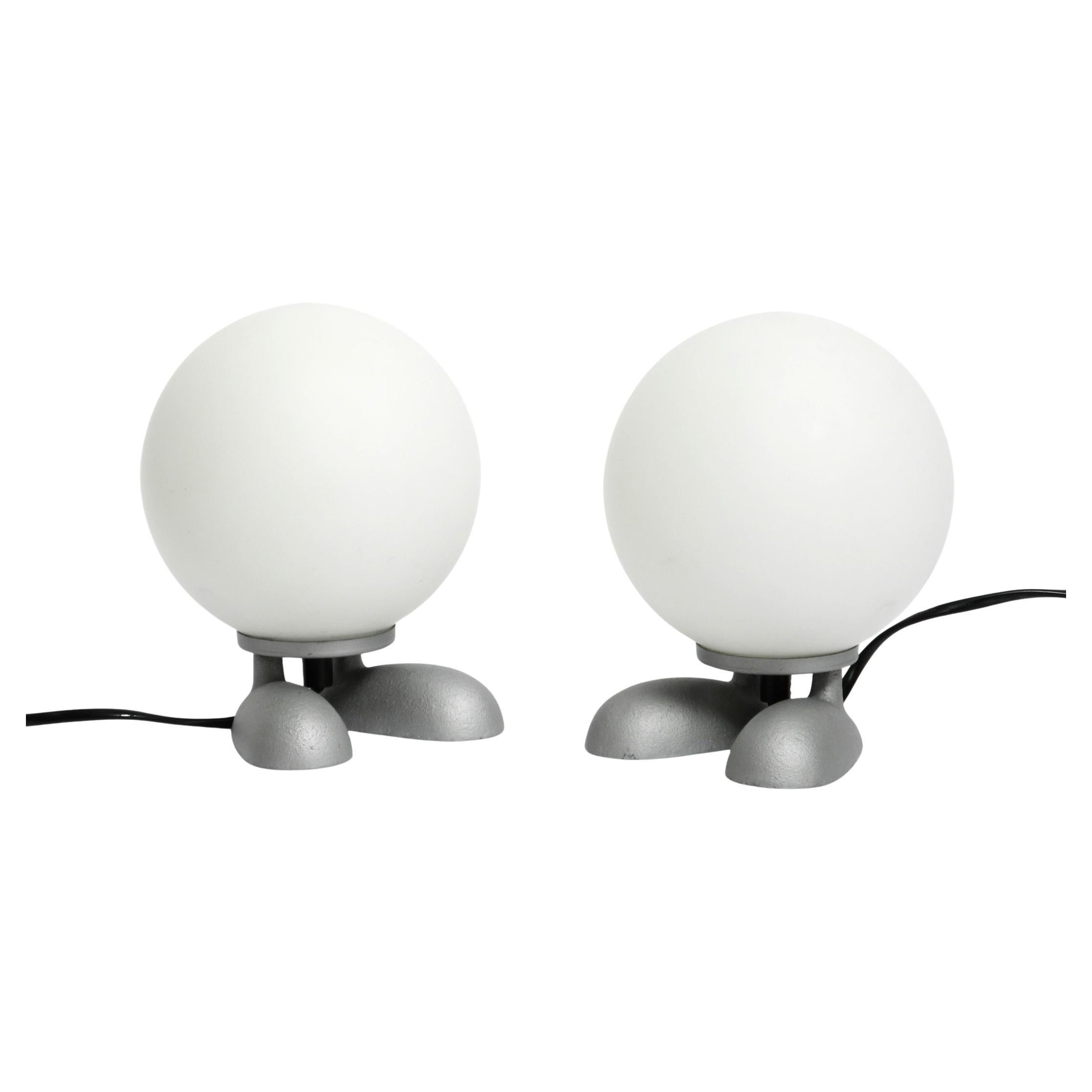 Pair of 1990s table lamps with a cast aluminum base with feet made by SOMPEX