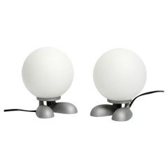 Pair of 1990s table lamps with a cast aluminum base with feet made by SOMPEX
