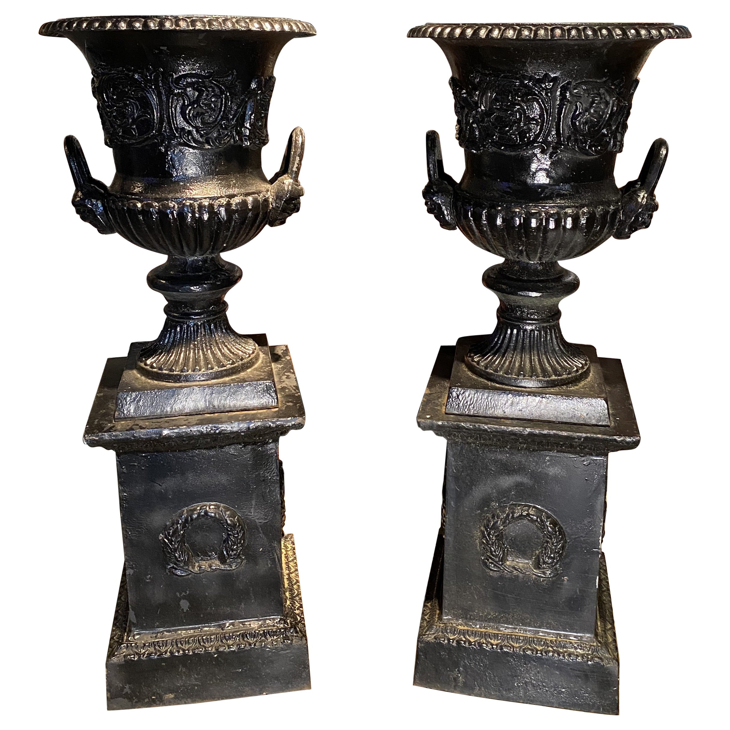 Pair of 19th/20th c Black Painted Cast Iron Classical Handled Urns w/ Pedestals
