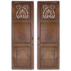 Pair of 19th-20th Century American Painted Shutters with Pierced Top Panel