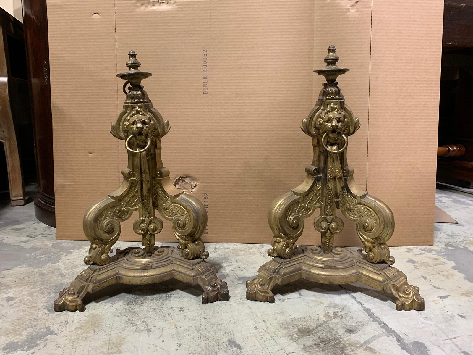 Pair of 19th-20th century brass lion fireplace chenets with rings.