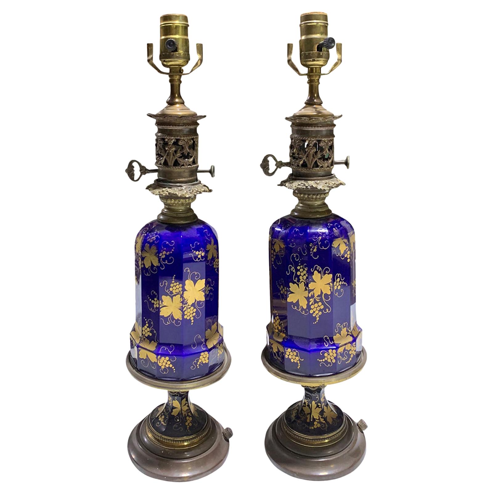Pair of 19th-20th Century Cobalt Blue and Gilt Glass Oil Lamps with Grape Leaf For Sale