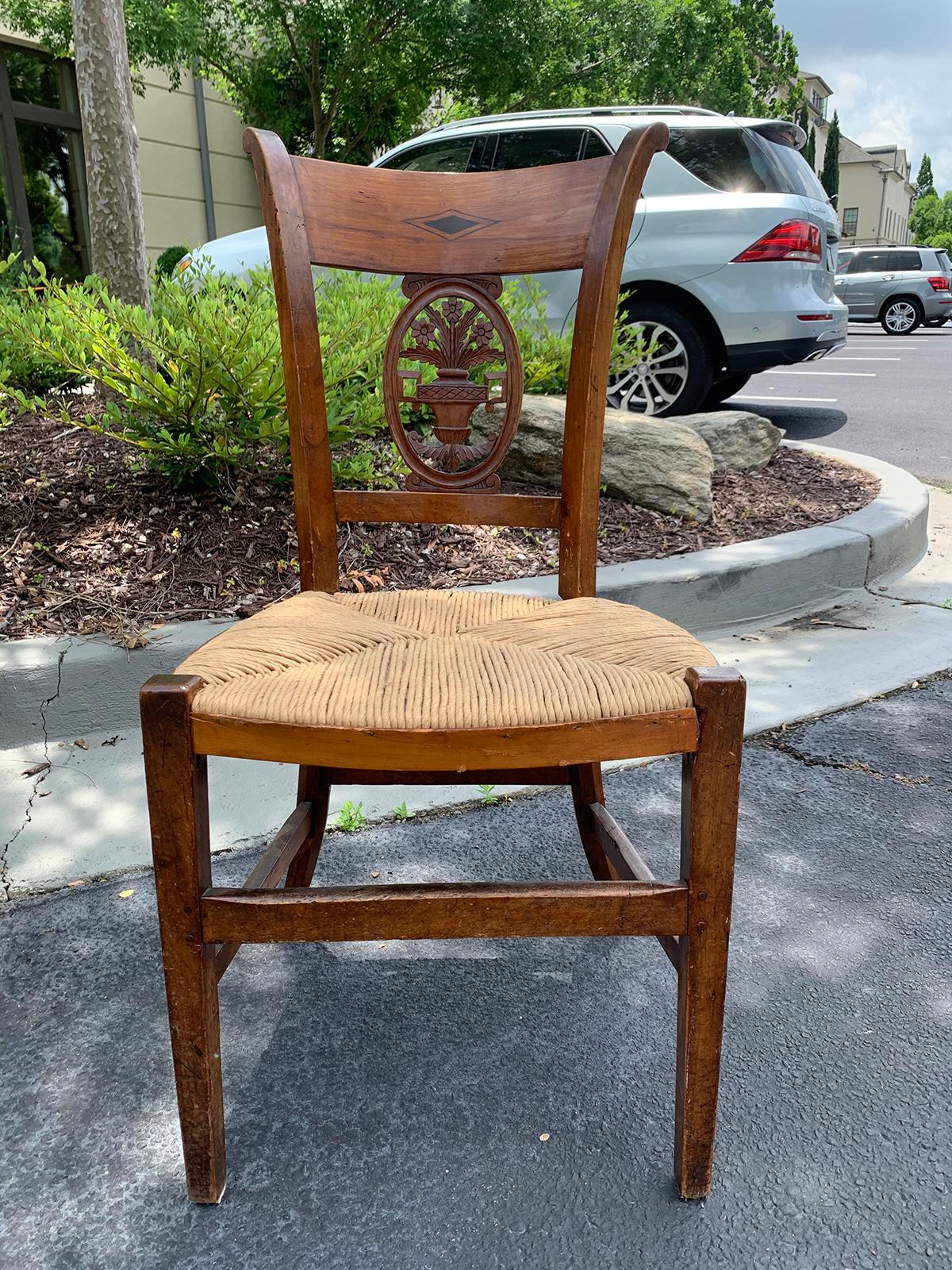 Pair of 19th-20th century French country carved side chairs with rush seats
Beautiful carving.