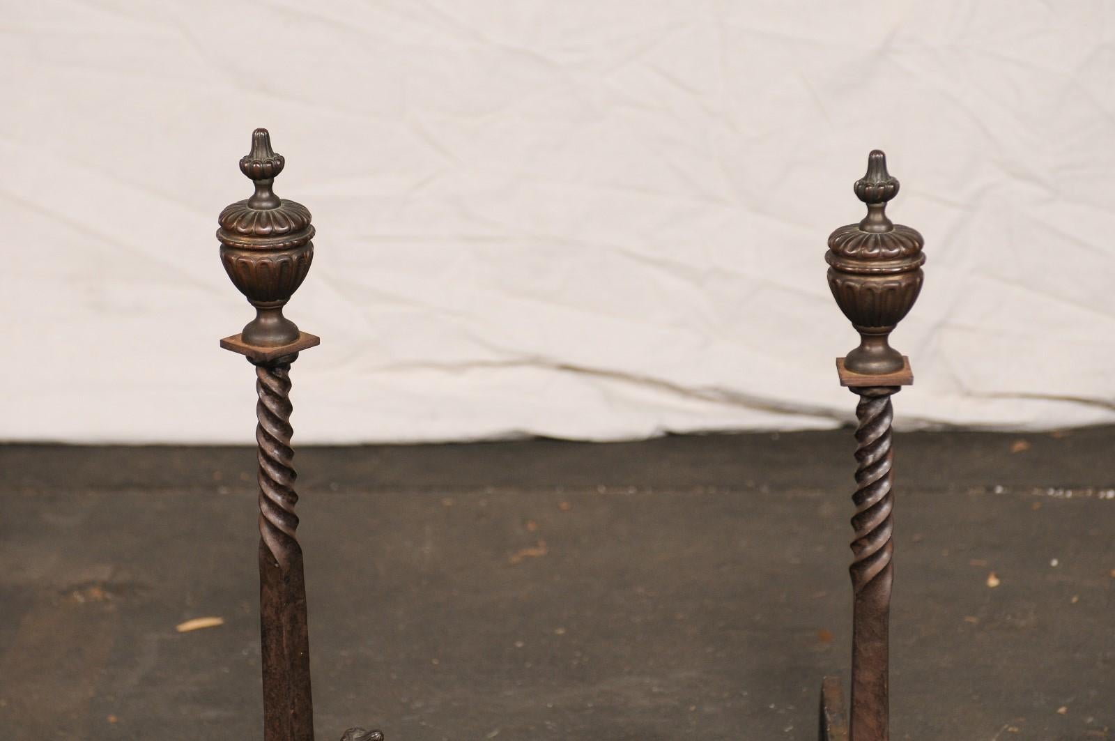 Pair of 19th-20th Century Iron Andirons with Partial Twist Columns & Urn Finials In Good Condition For Sale In Atlanta, GA