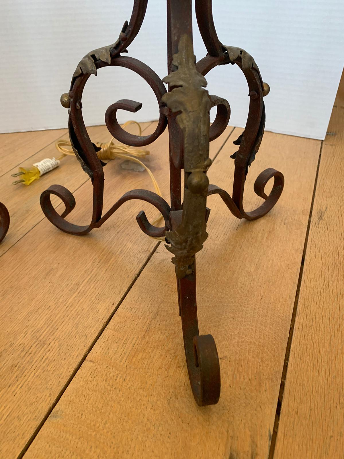 Pair of 19th-20th century iron candlesticks with gilt details as lamps
New wiring.