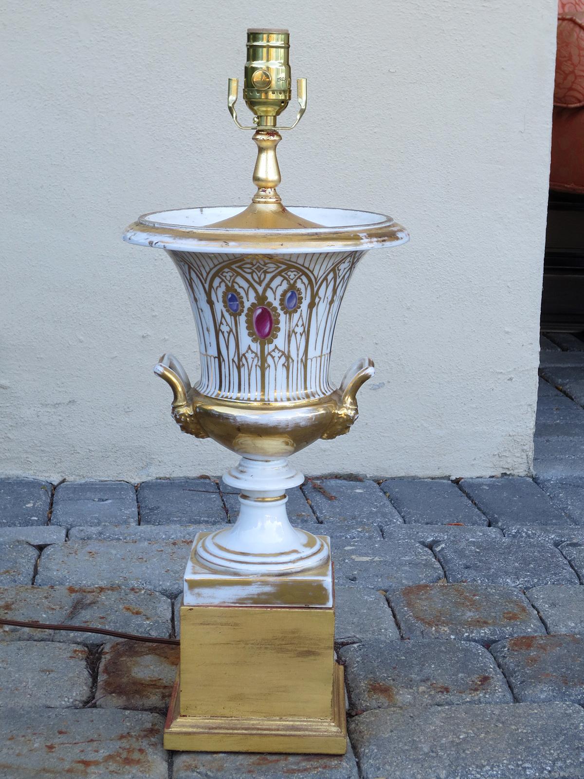 Pair of 19th-20th century Old Paris porcelain urns as lamps on custom gilt bases
New wiring.