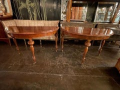 Pair of 19th c. Continental Walnut Demi-lune Consoles