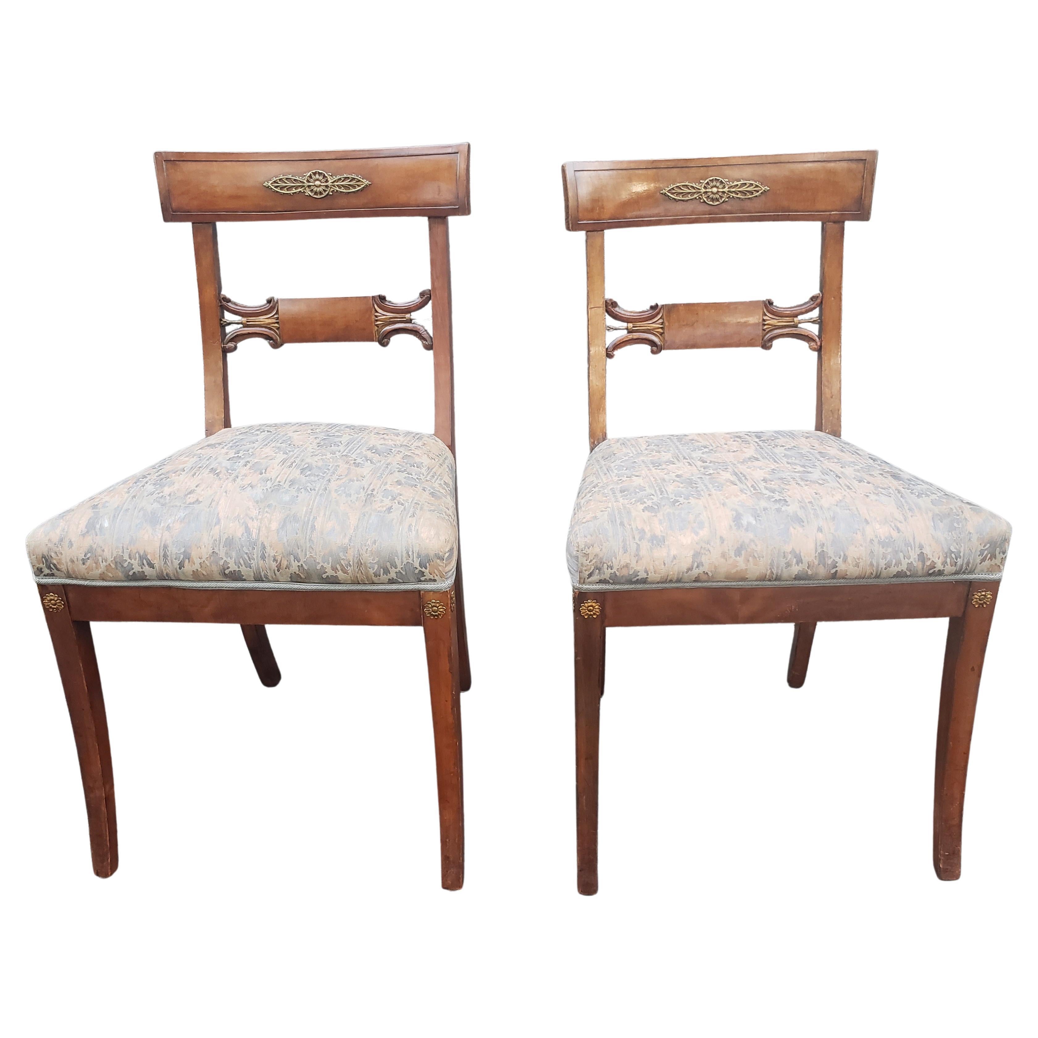 Pair of 19th century Empire Ormolu Mounted, Partial Gilt Mahogany & Upholstered side Chairs. 
Measure 19