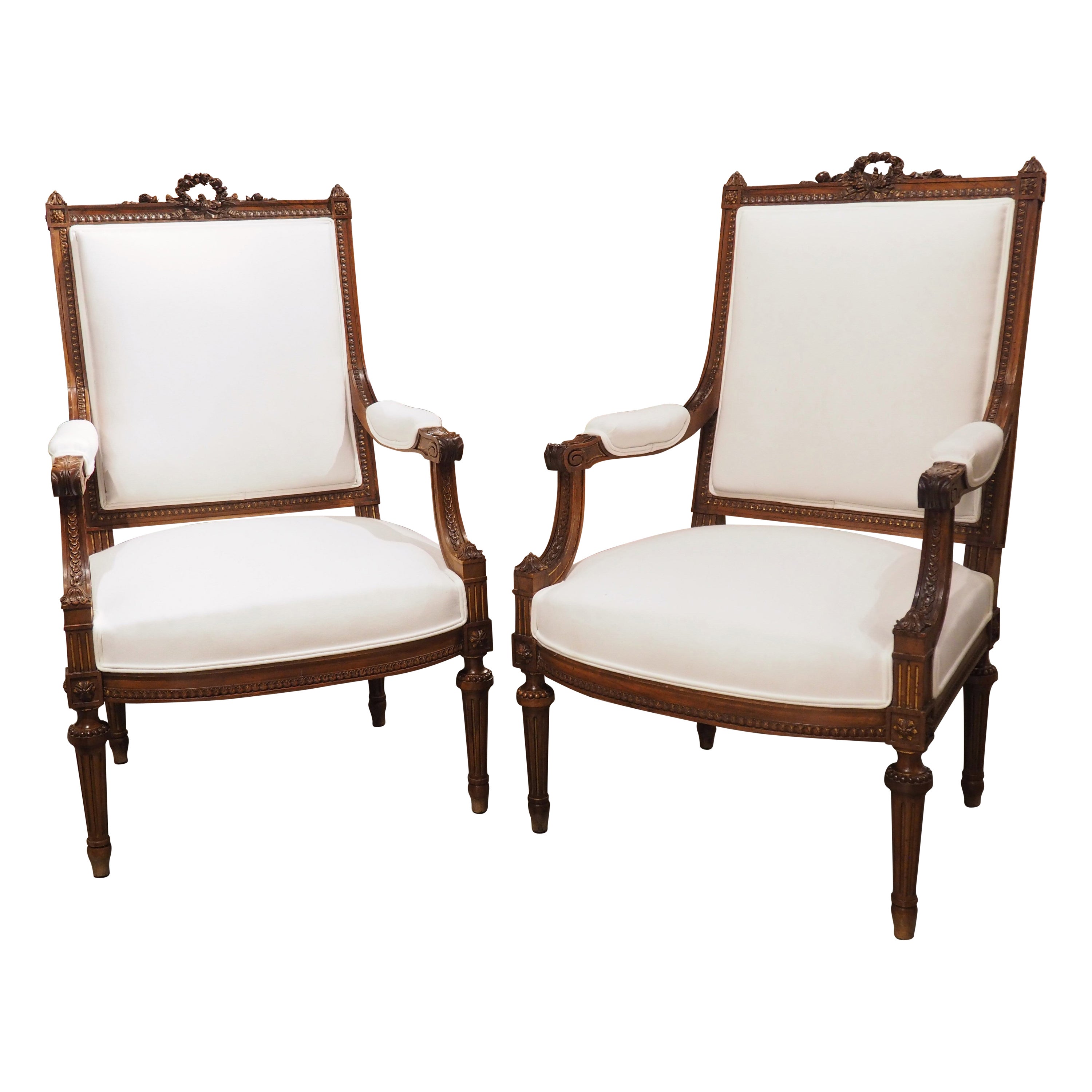 Pair of 19th C. French Louis XVI Style Walnut Fauteuils à la Reine Armchairs