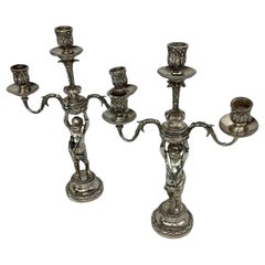Paire de chandeliers Putti en bronze argenté du XIXème siècle.