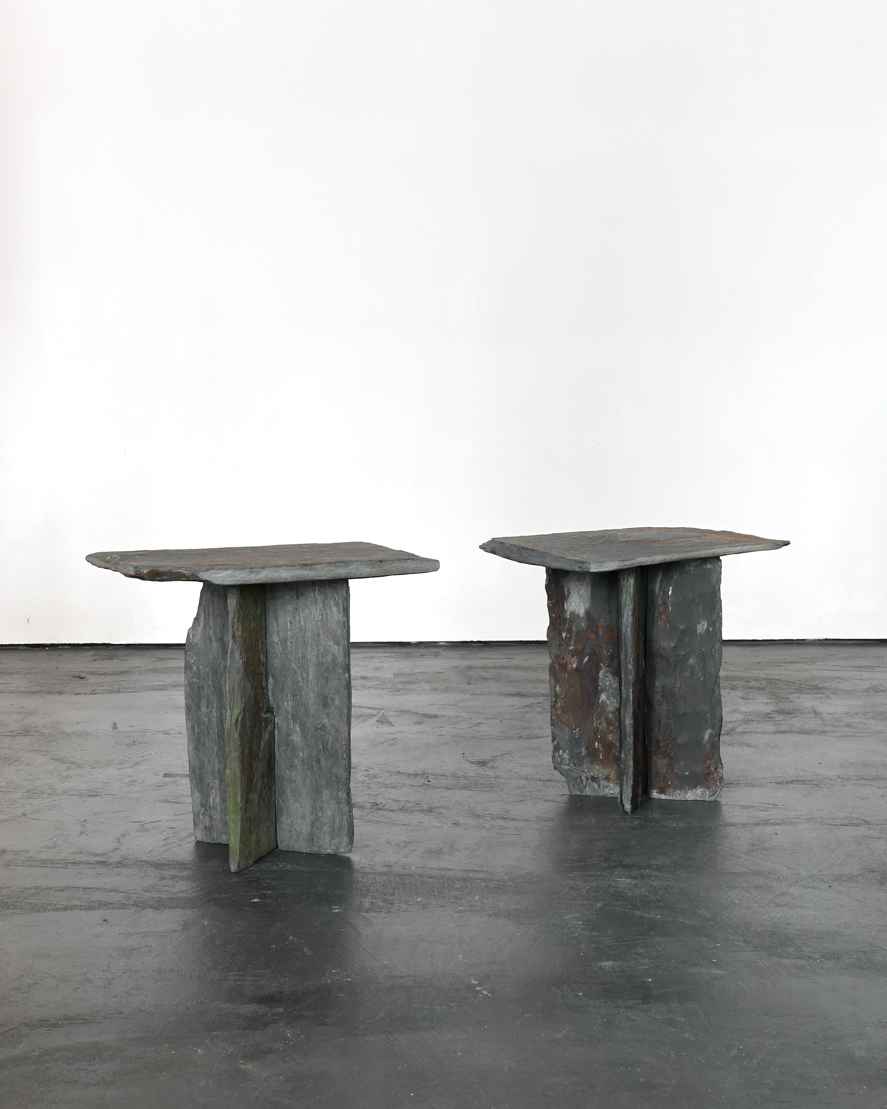 A pair of primitive riven slate side tables from the Angers region of France.

Simple interlocking bases.

Made in the late 19th C. By slate quarry workers.