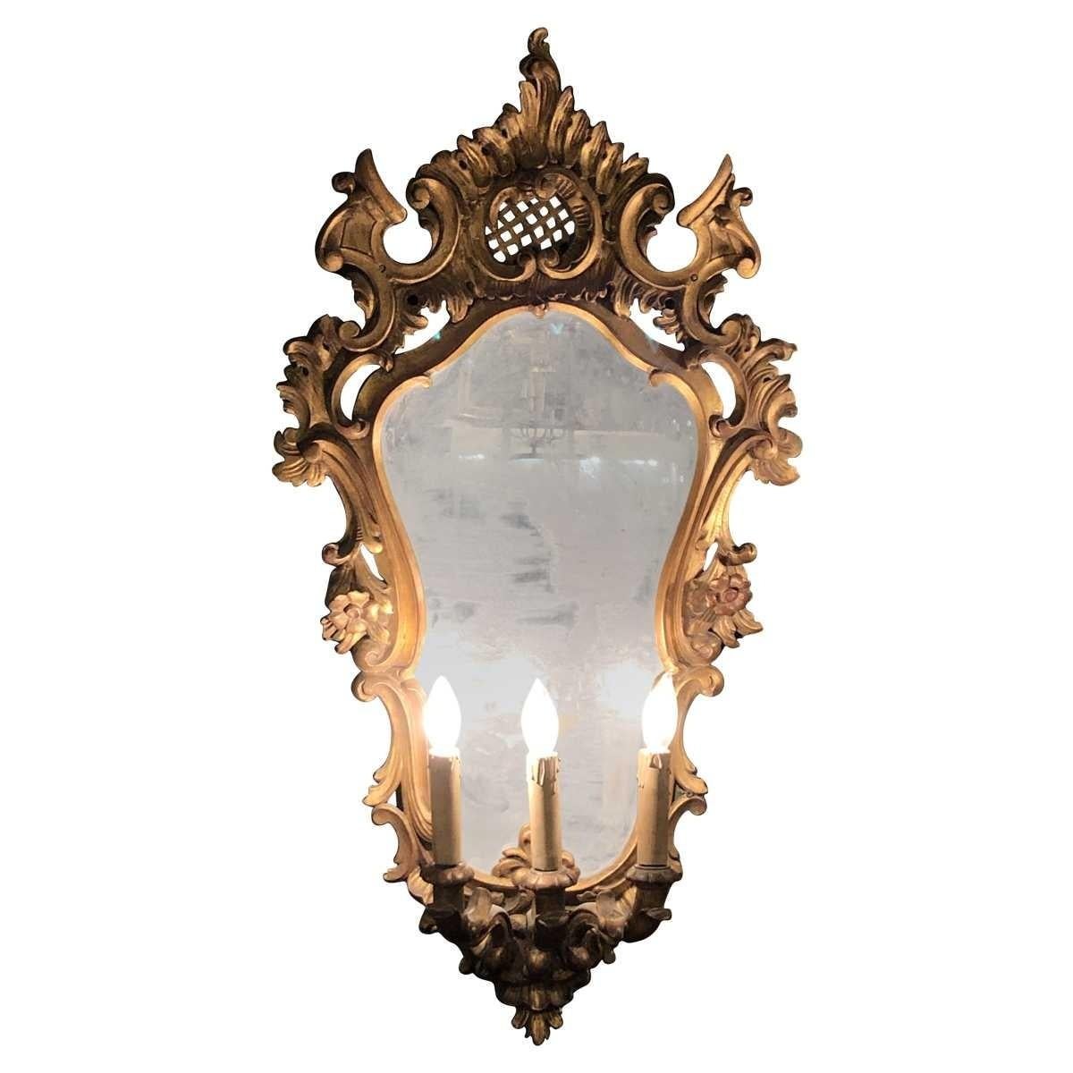 Rococo Pair of 19th Century Italian Carved Three-Light Mirrored Sconces For Sale