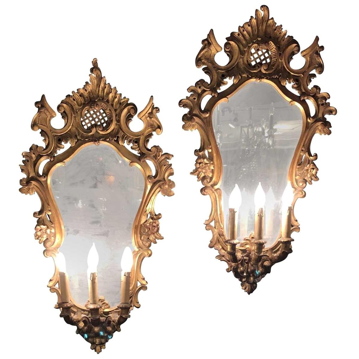 Pair of 19th Century Italian Carved Three-Light Mirrored Sconces For Sale